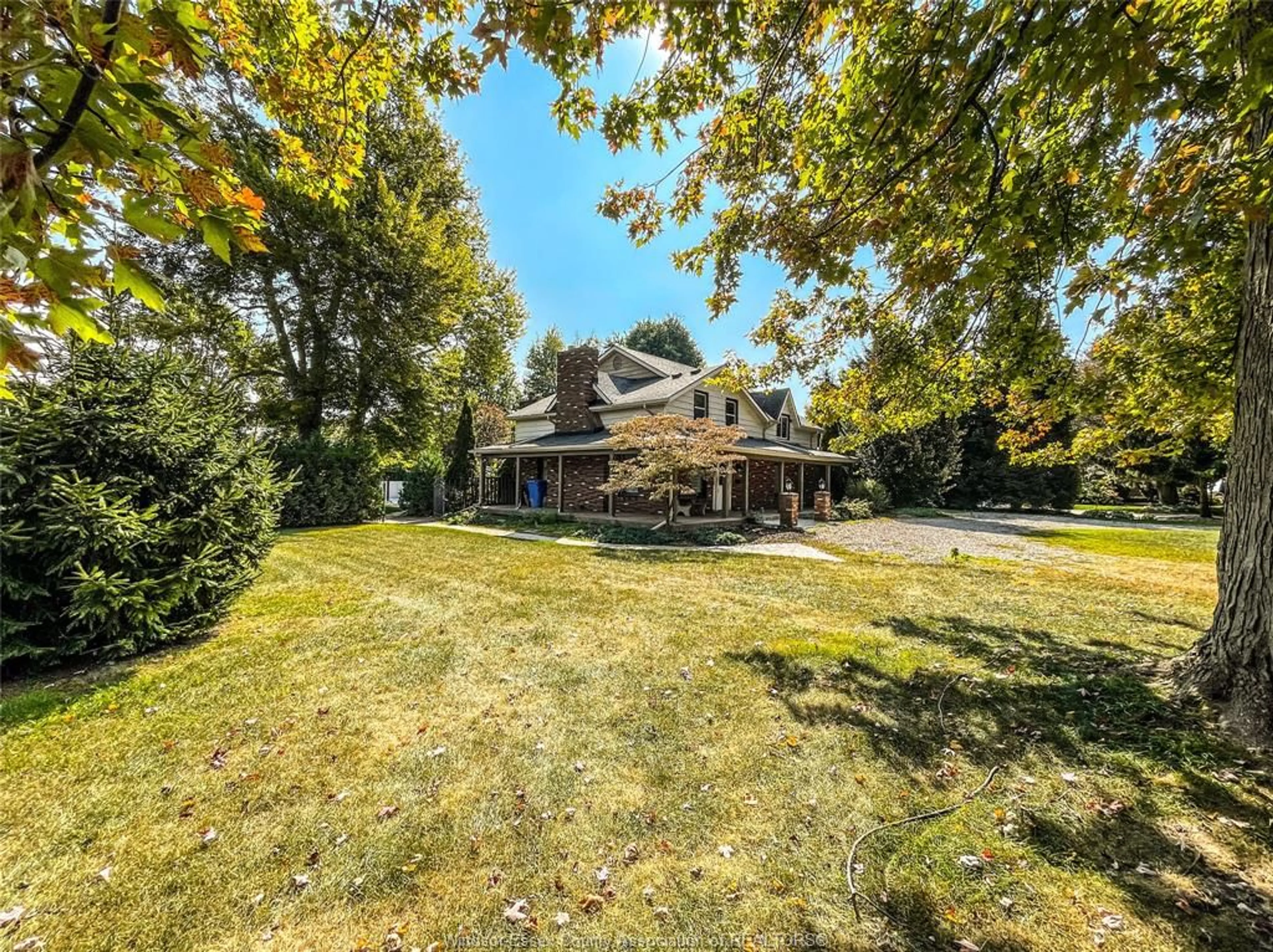 A pic from outside/outdoor area/front of a property/back of a property/a pic from drone, unknown for 90 Townline Road, Leamington Ontario N8H 4G8