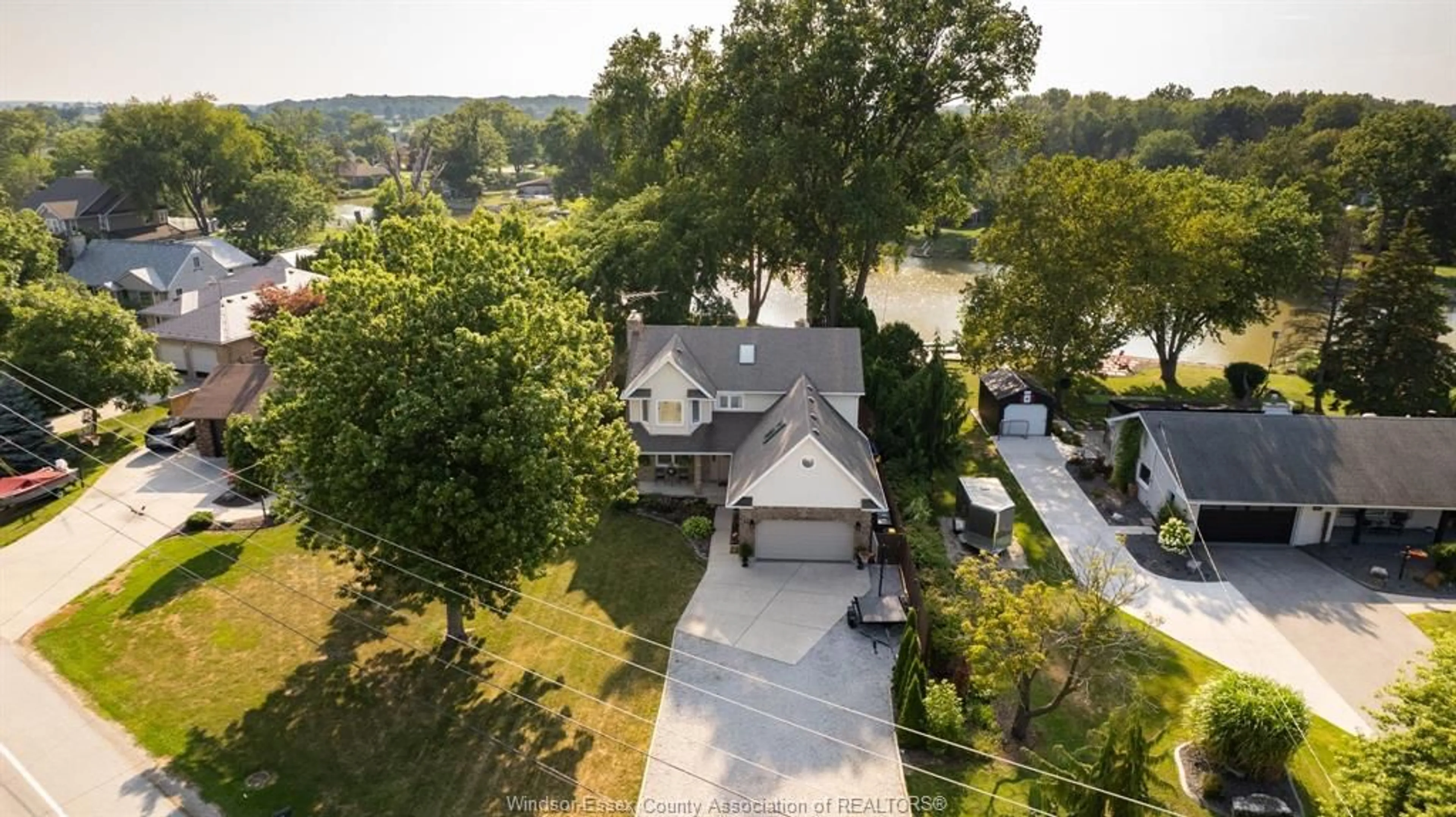 A pic from outside/outdoor area/front of a property/back of a property/a pic from drone, water/lake/river/ocean view for 237 EAST PUCE, Lakeshore Ontario N0R 1A0