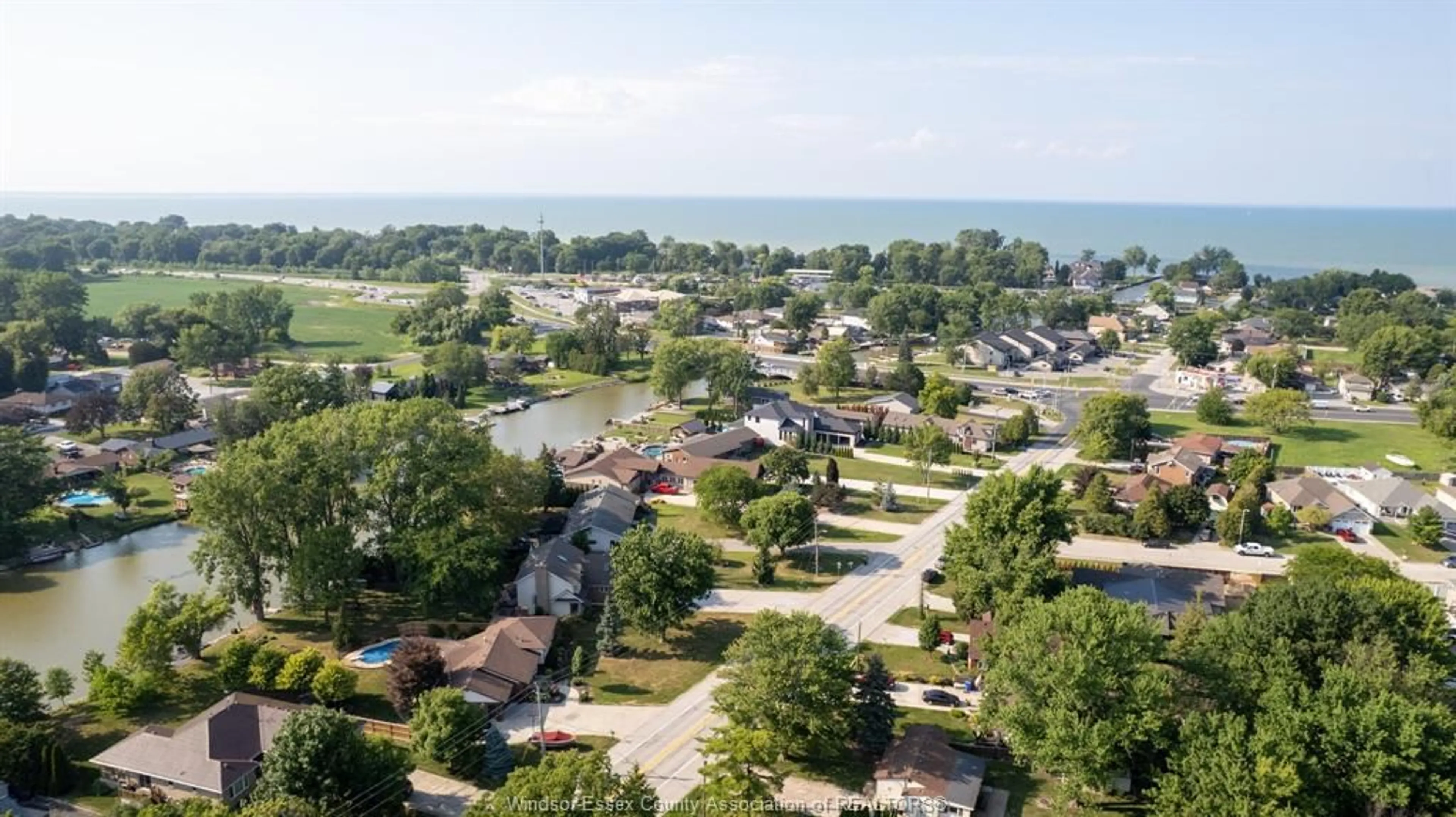 A pic from outside/outdoor area/front of a property/back of a property/a pic from drone, water/lake/river/ocean view for 237 EAST PUCE, Lakeshore Ontario N0R 1A0