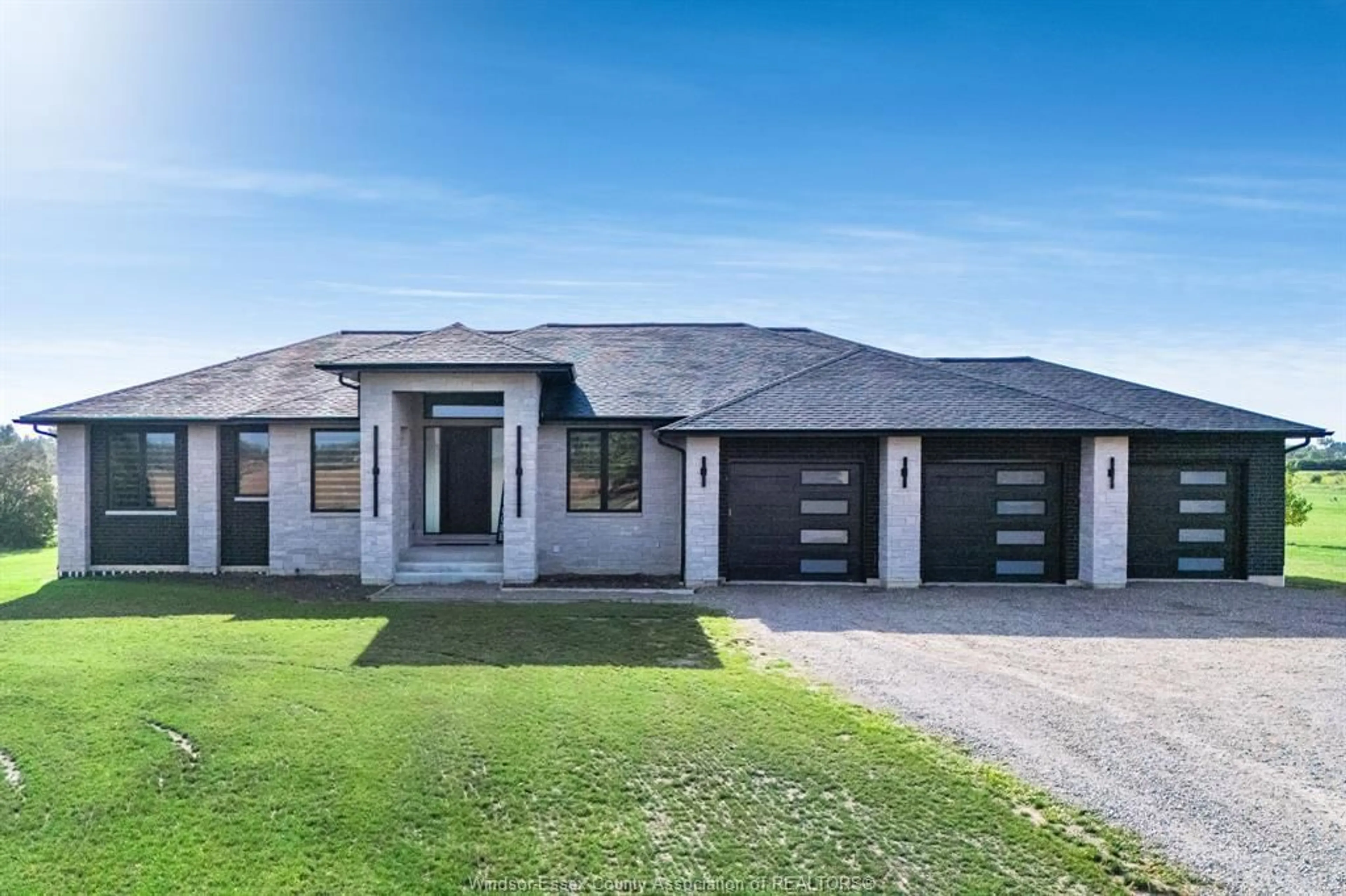 Home with brick exterior material, street for 188 County Rd 27 E, Cottam Ontario N0R 1B0