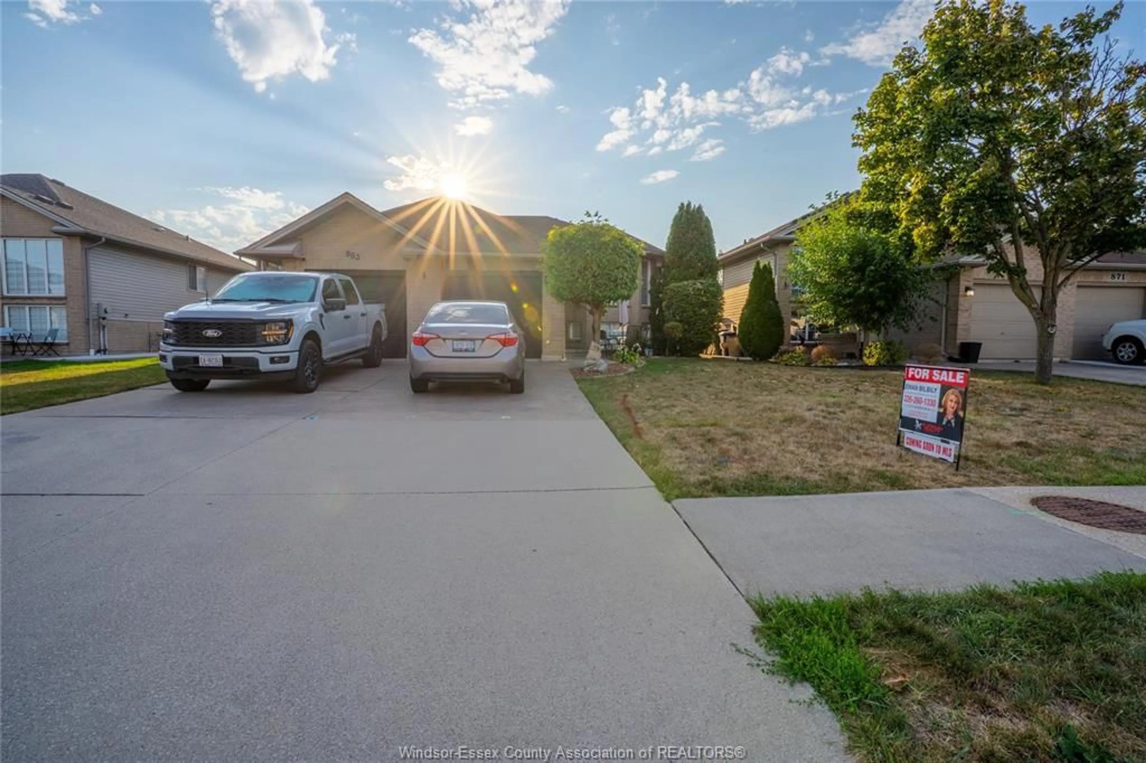 A pic from outside/outdoor area/front of a property/back of a property/a pic from drone, street for 879 MICHAEL, Tecumseh Ontario N8N 5A3