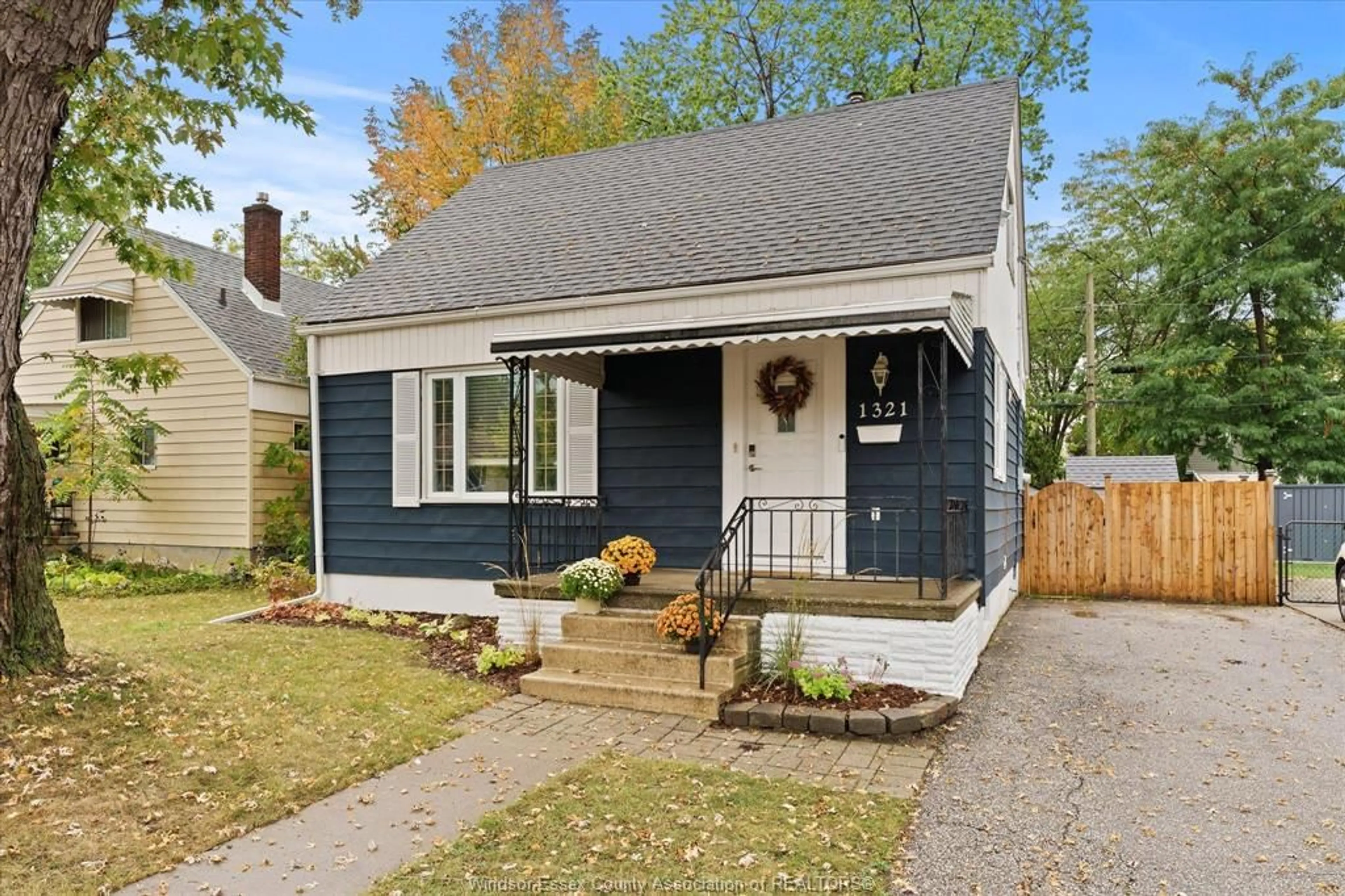 Home with vinyl exterior material, street for 1321 TOURANGEAU, Windsor Ontario N8Y 4J1