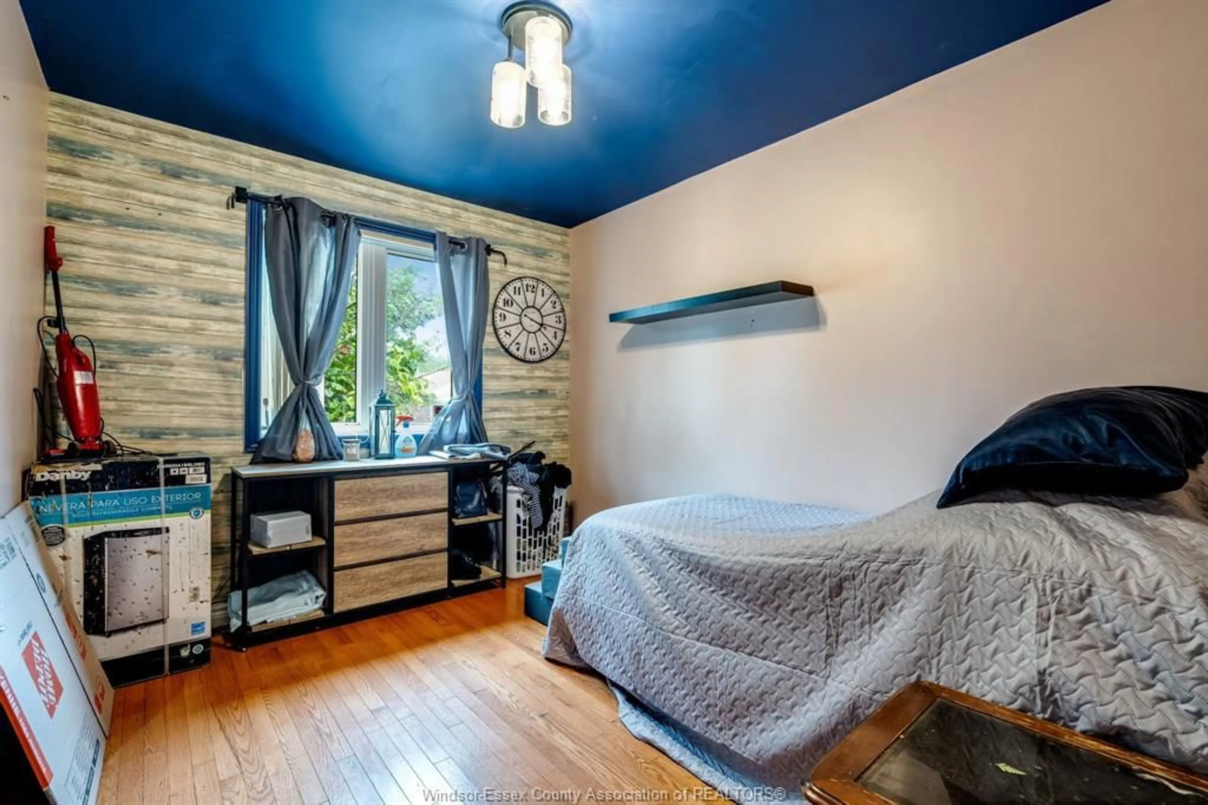 Bedroom with bed, wood/laminate floor for 1833 St. Luke, Windsor Ontario N8W 3W8