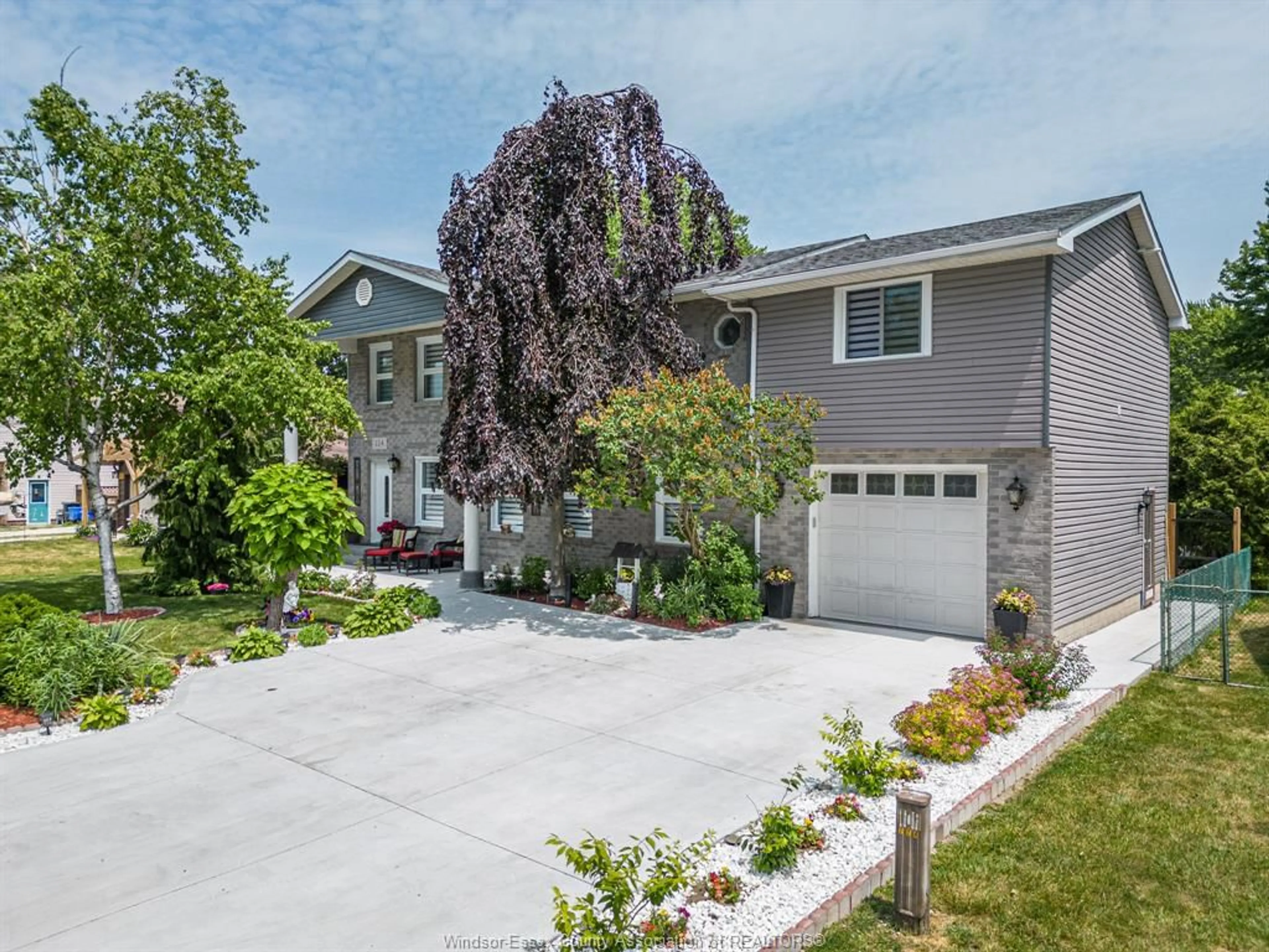 Home with vinyl exterior material, street for 224 CARUHEL, Lakeshore Ontario N0R 1C0