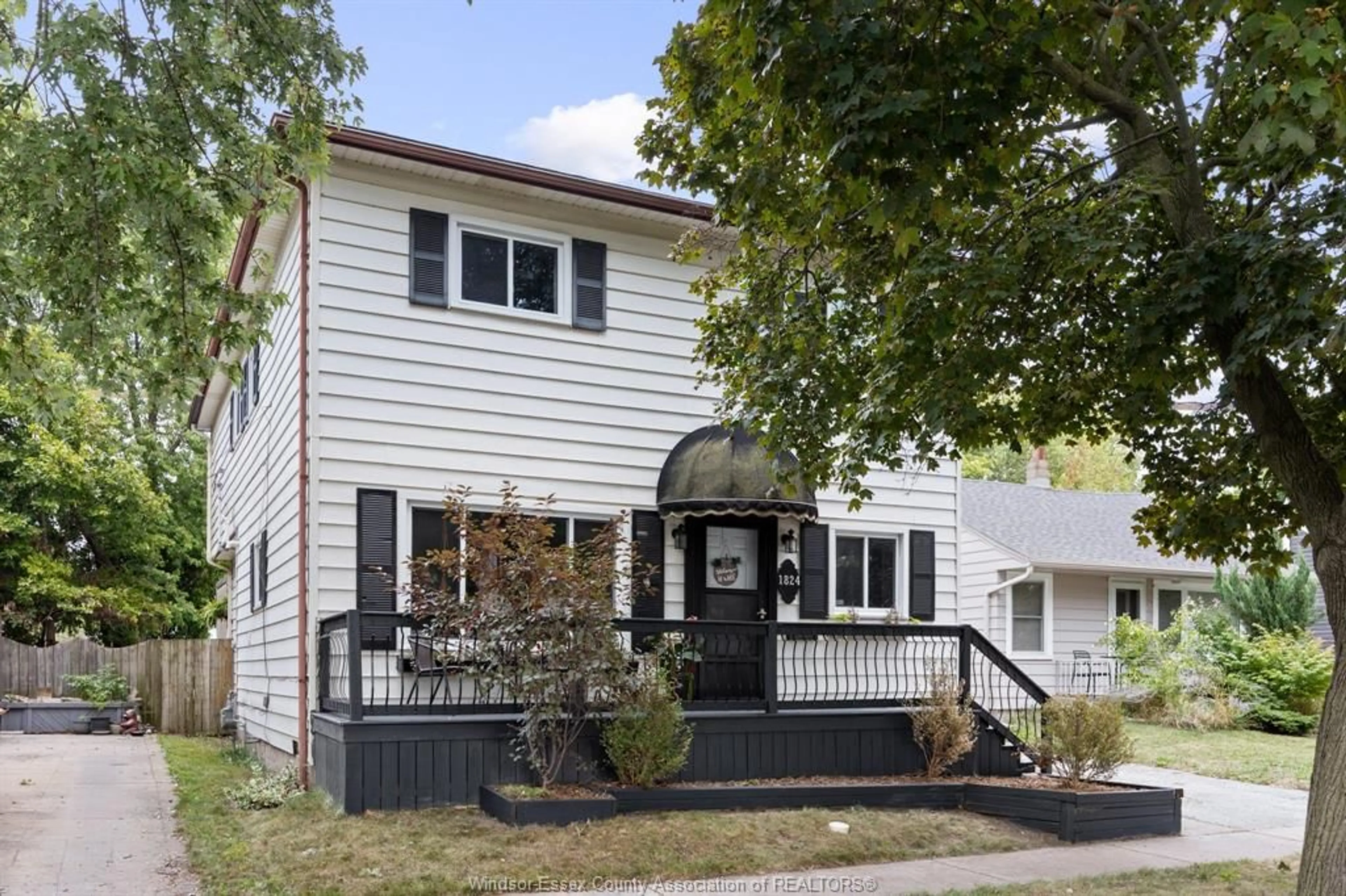 Home with vinyl exterior material, street for 1824 WESTCOTT Rd, Windsor Ontario N8W 4K2