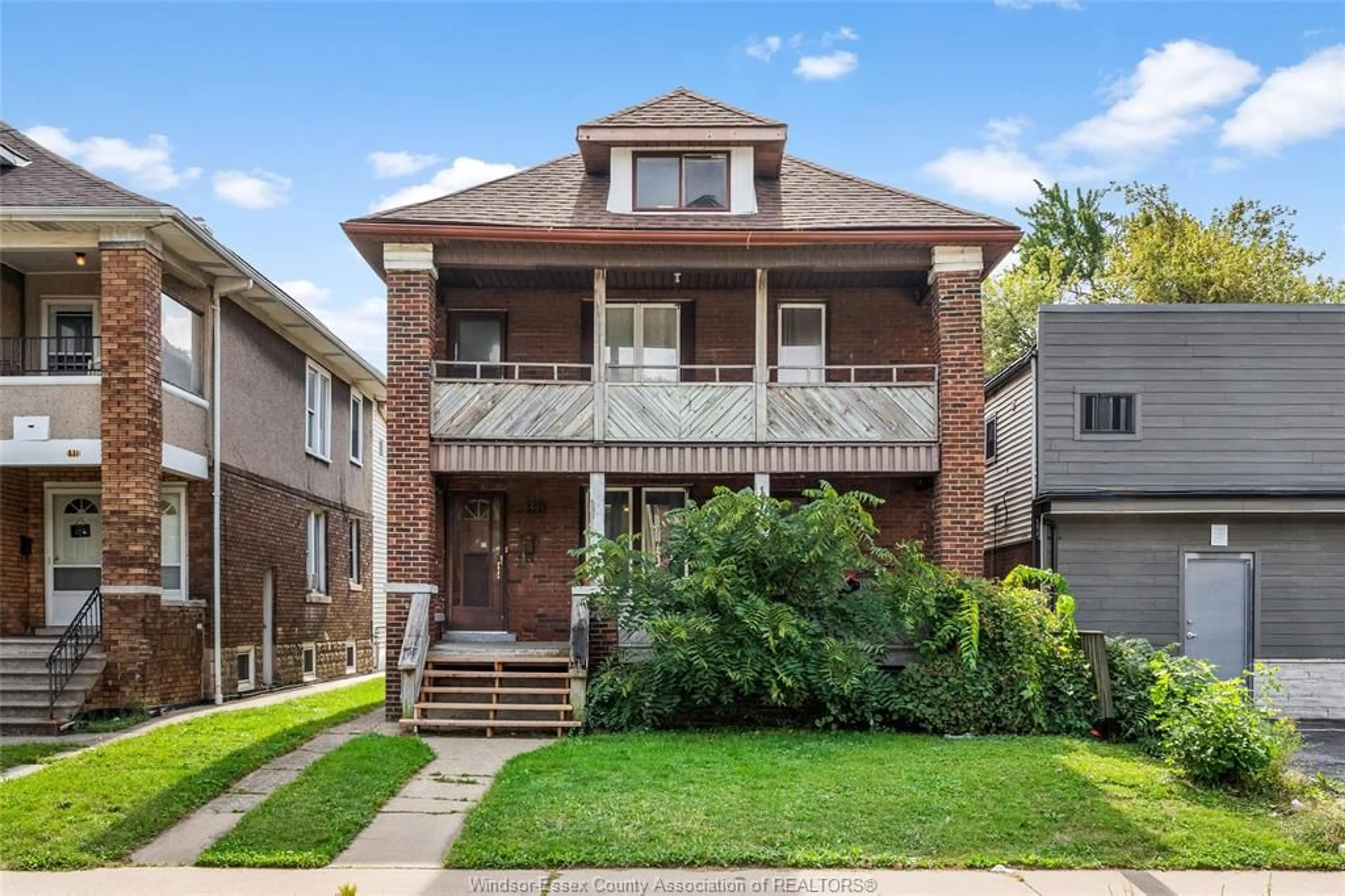 Home with brick exterior material, street for 521-523 GILES Blvd, Windsor Ontario N9A 4E1