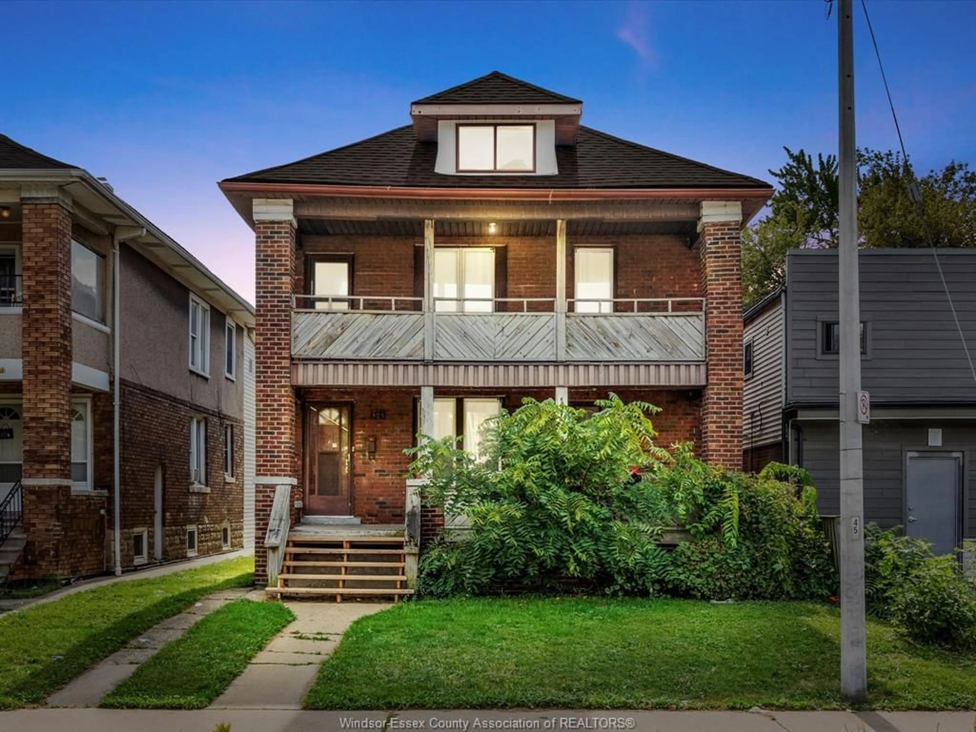 Home with brick exterior material, street for 521-523 GILES Blvd, Windsor Ontario N9A 4E1