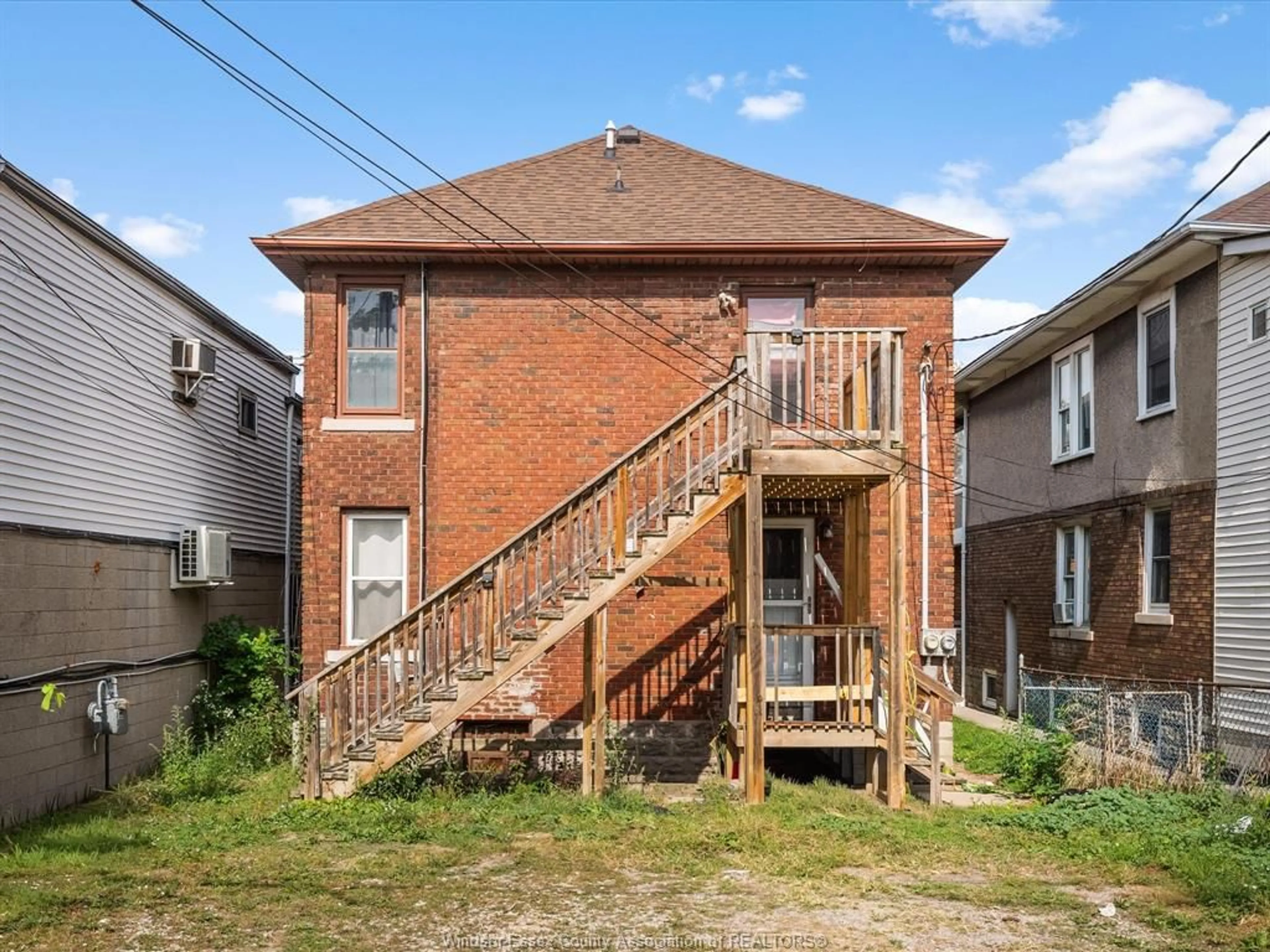 Home with brick exterior material, street for 521-523 GILES Blvd, Windsor Ontario N9A 4E1