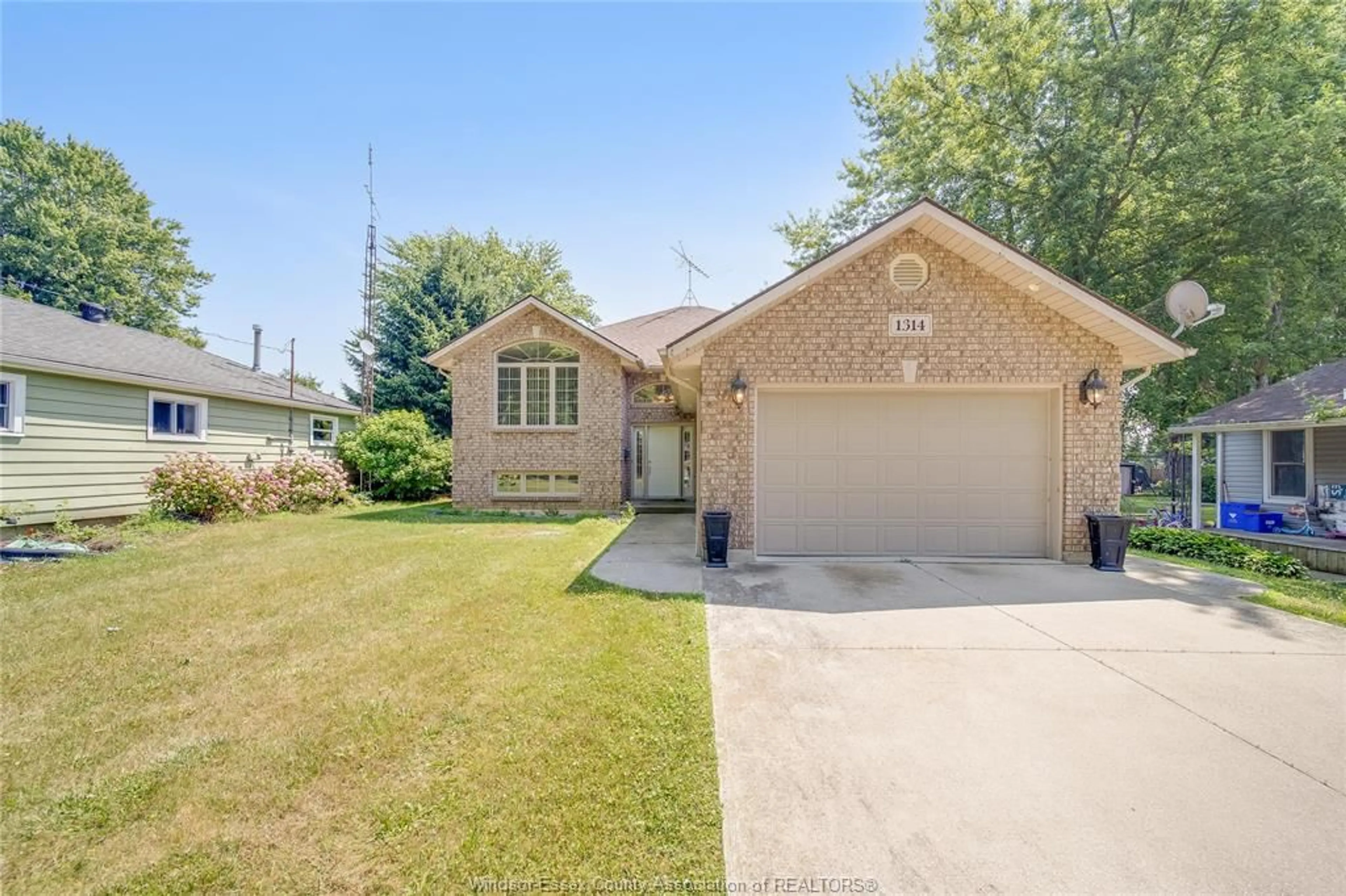 Home with brick exterior material, street for 1314 ORCHARD BLVD, Kingsville Ontario N9Y 2R7