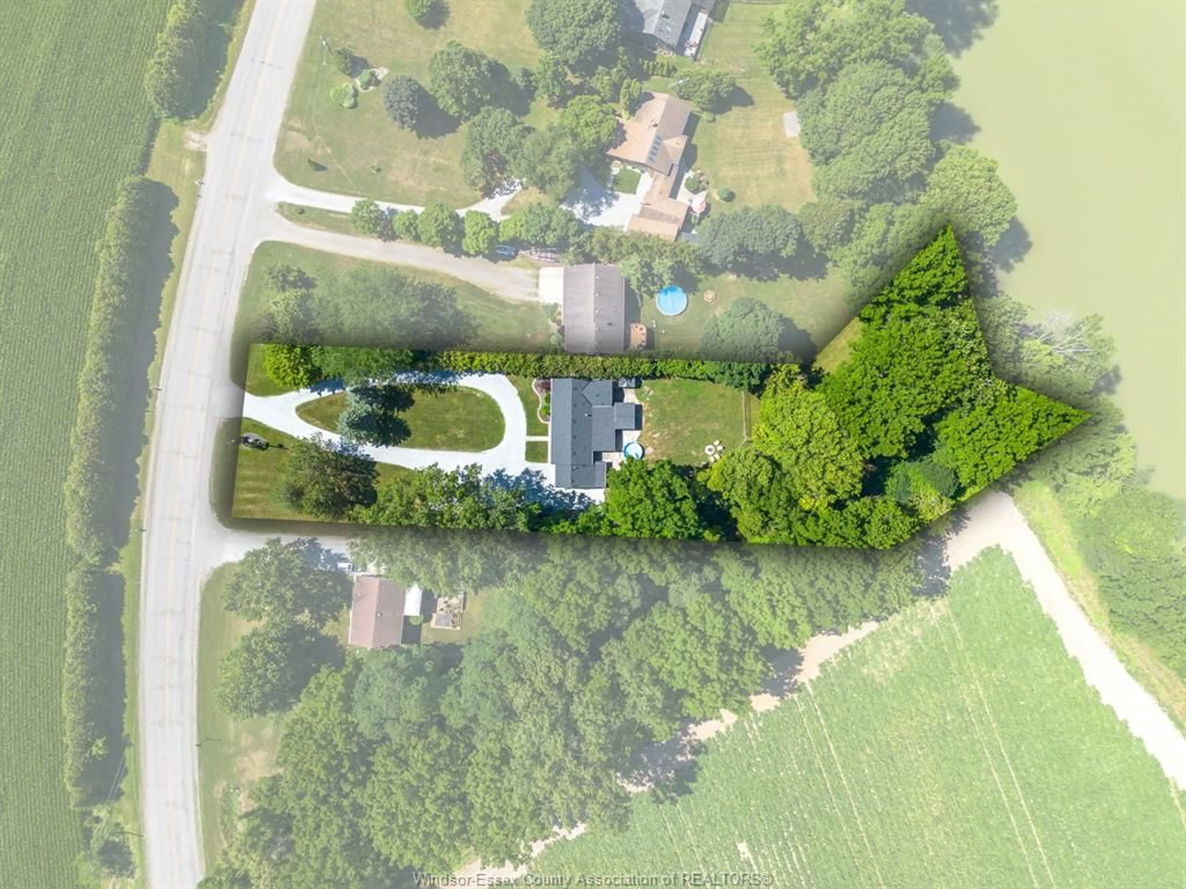 A pic from outside/outdoor area/front of a property/back of a property/a pic from drone, street for 9395 River Line, Chatham Ontario N7M 5J4
