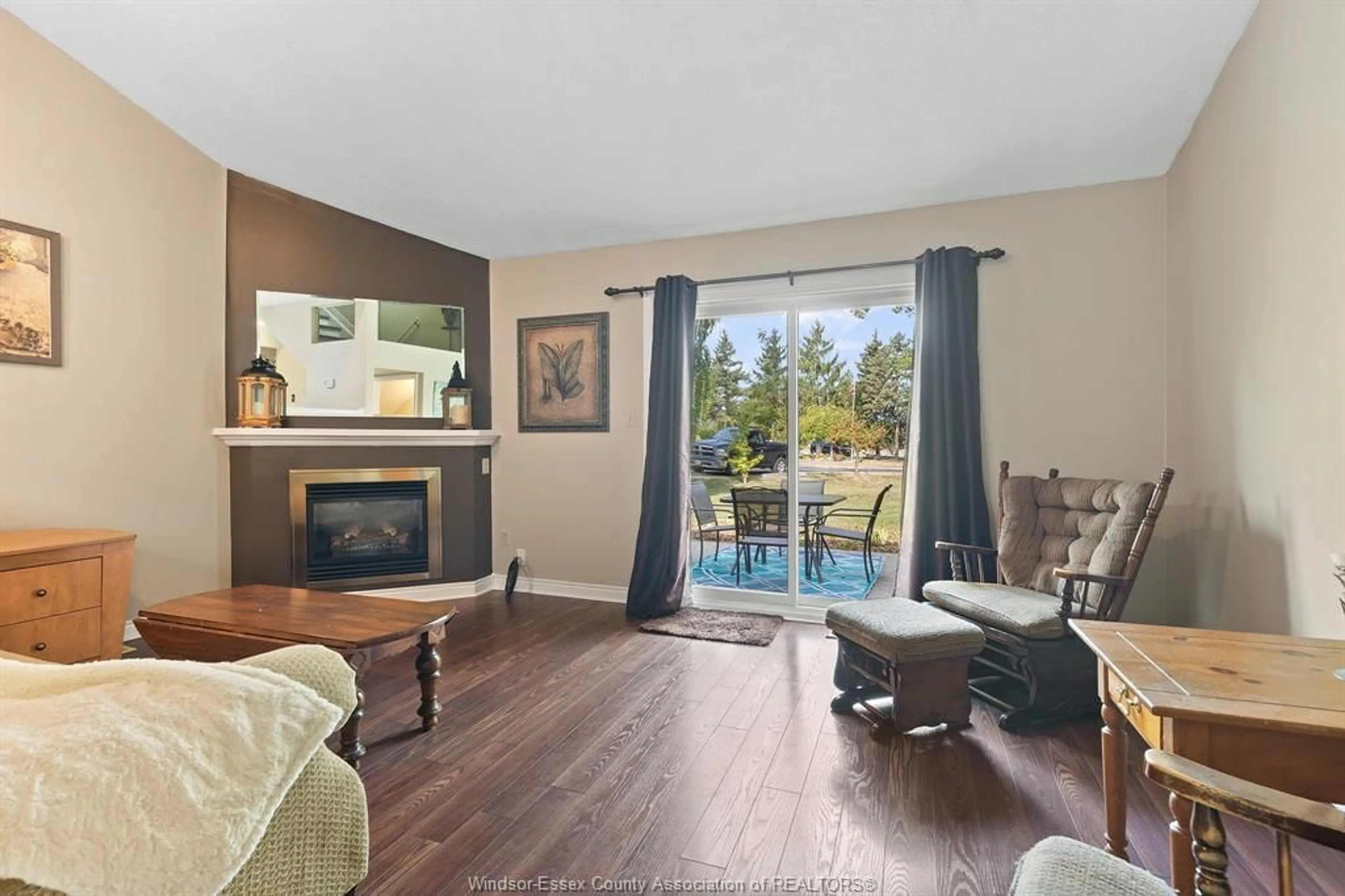 Living room with furniture, wood/laminate floor for 201 CONCESSION 3 #7, Harrow Ontario N0R 1G0