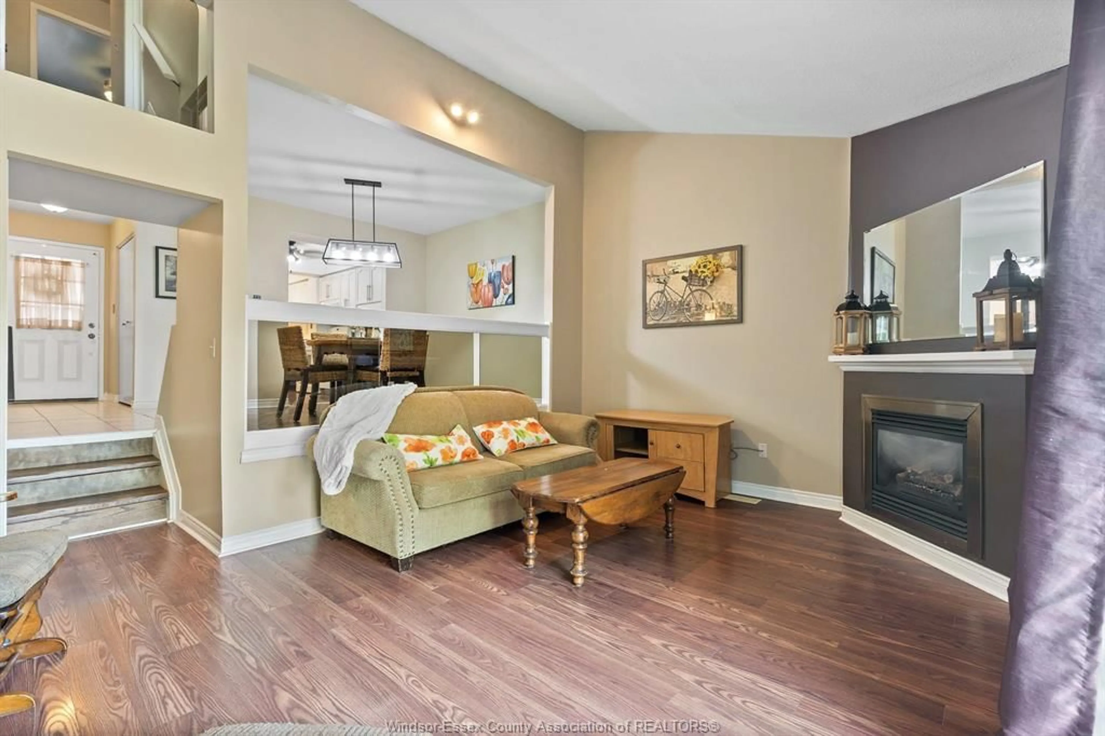 Living room with furniture, wood/laminate floor for 201 CONCESSION 3 #7, Harrow Ontario N0R 1G0