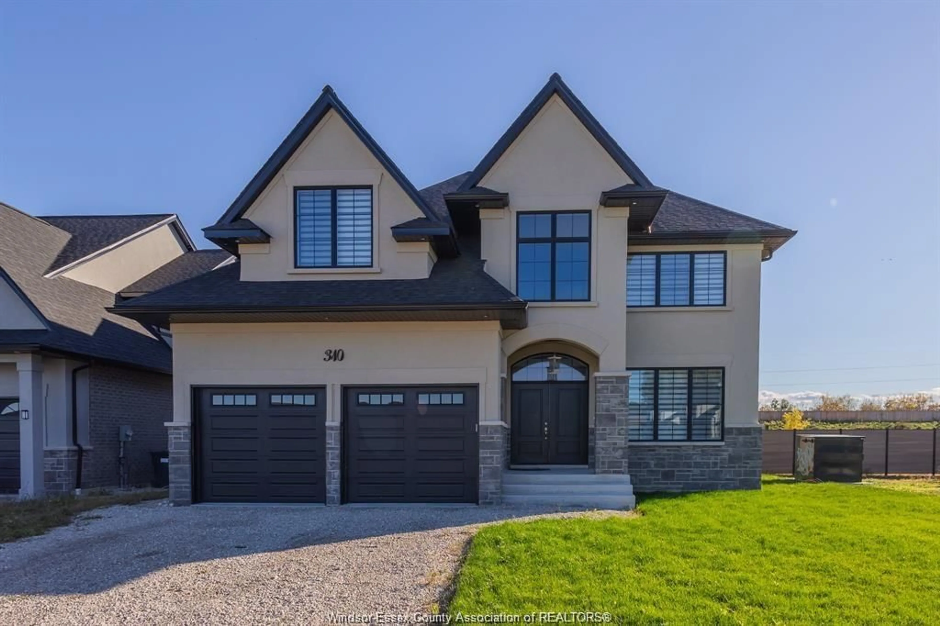 Home with brick exterior material, street for 310 BLAKE, Belle River Ontario N0R 1A0