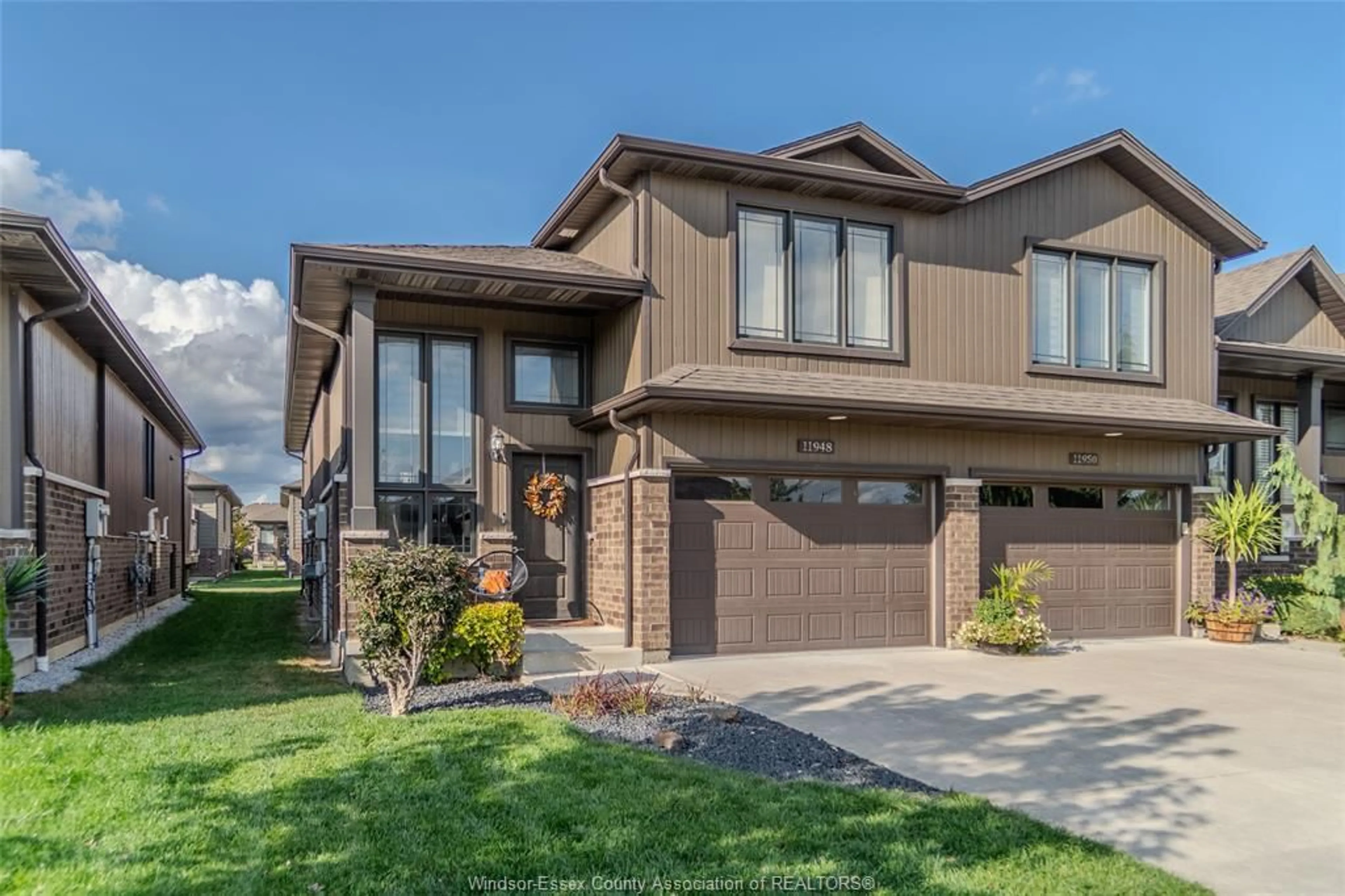 Home with brick exterior material, street for 11948 Thistledown, Windsor Ontario N8P 0B7