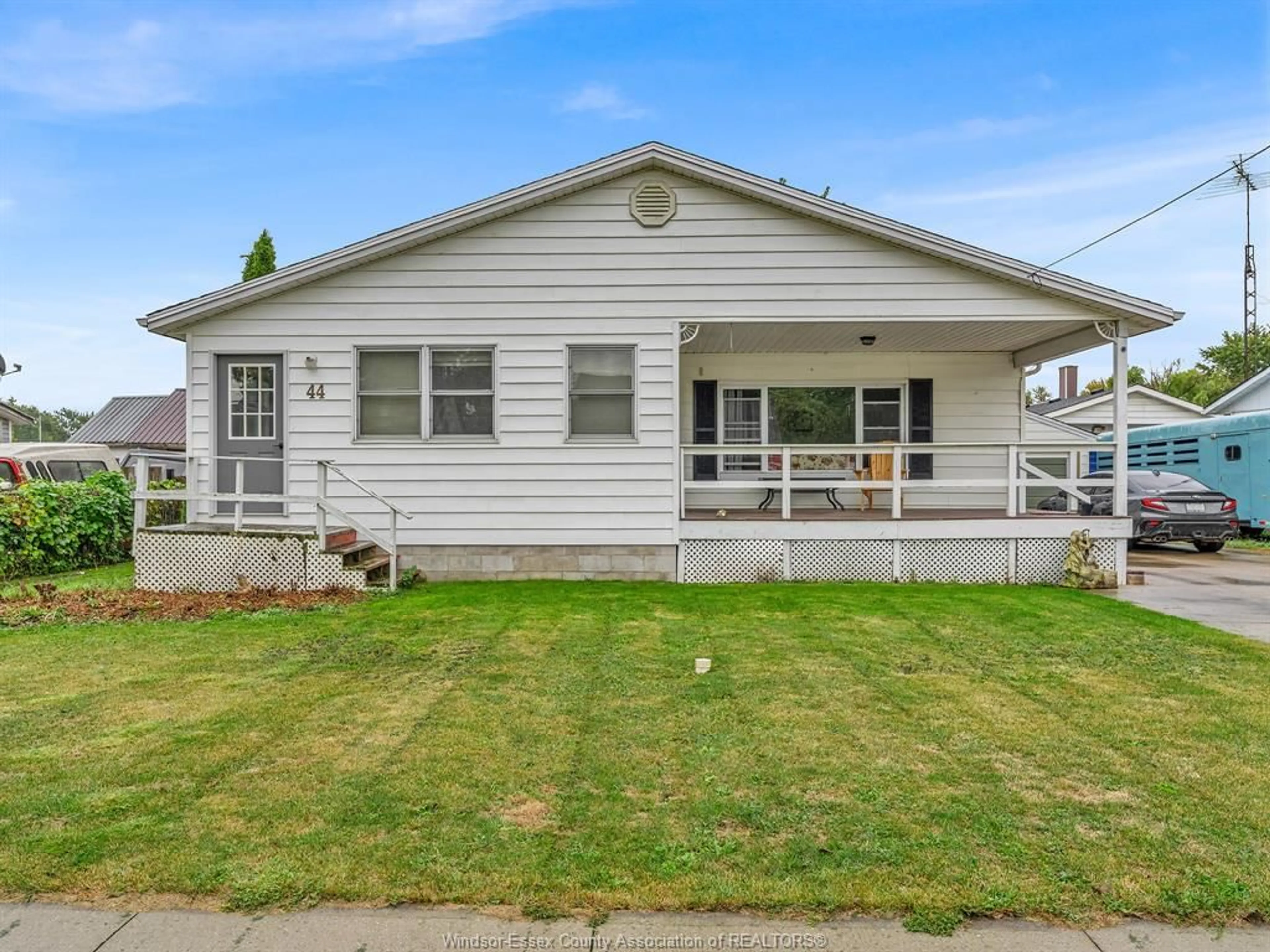 Home with vinyl exterior material, street for 44 Fort St, Tilbury Ontario N0P 2L0
