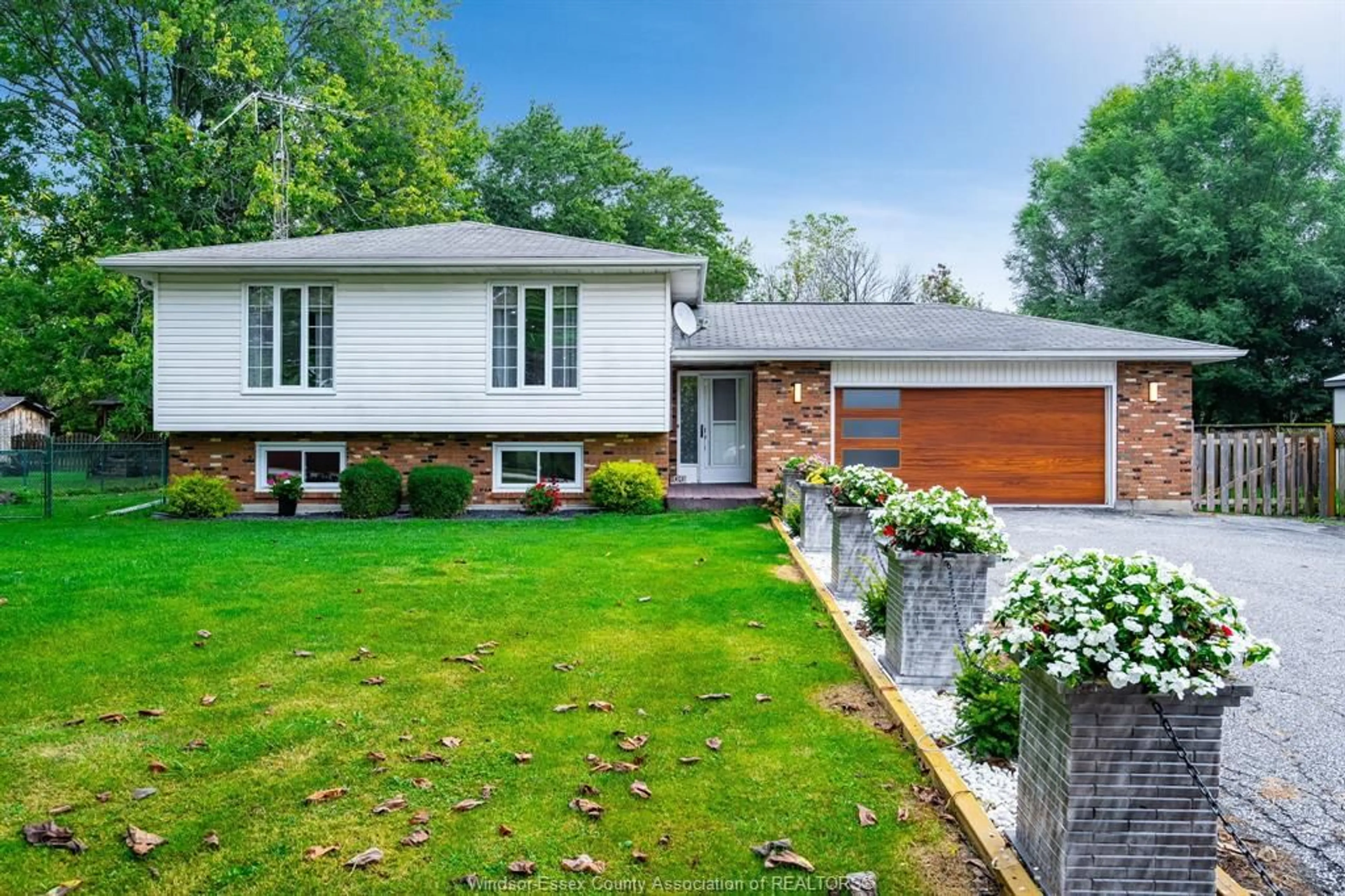 Home with brick exterior material, street for 21309 Harbour Rd, Wheatley Ontario N0P 2P0