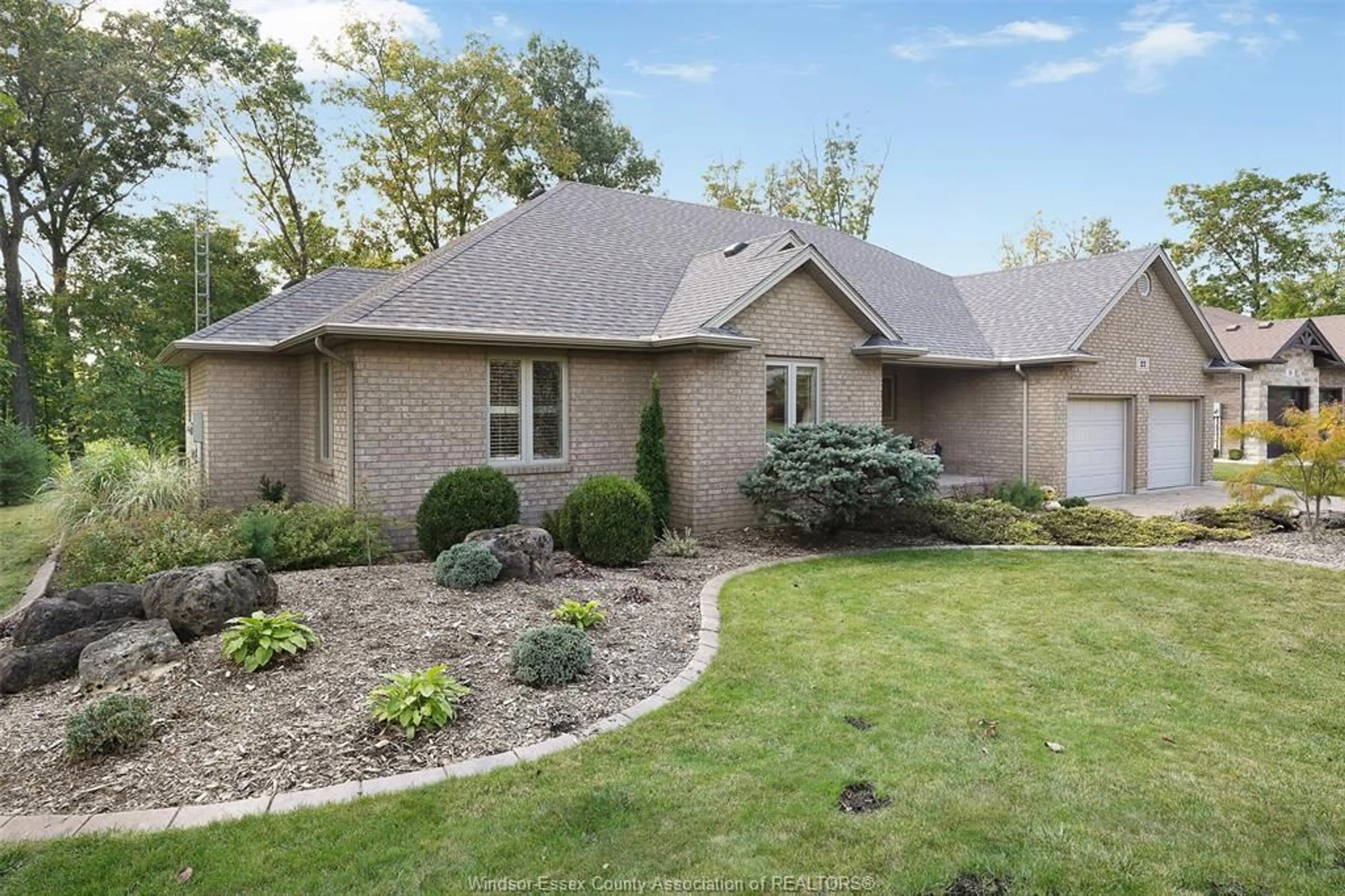Home with brick exterior material, street for 22 TWO CREEKS Lane, Wheatley Ontario N9P 2P0