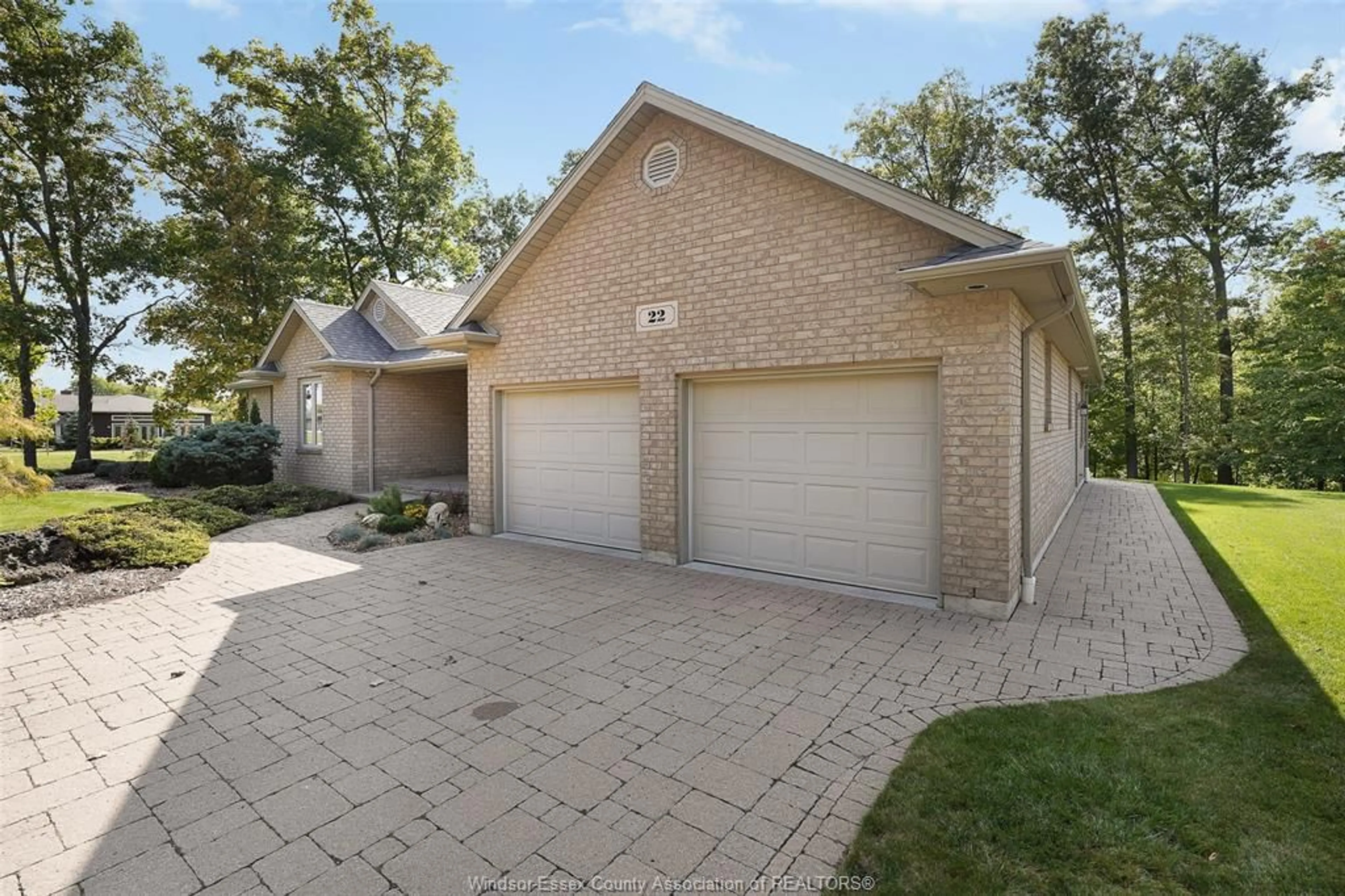 Home with brick exterior material, street for 22 TWO CREEKS Lane, Wheatley Ontario N9P 2P0