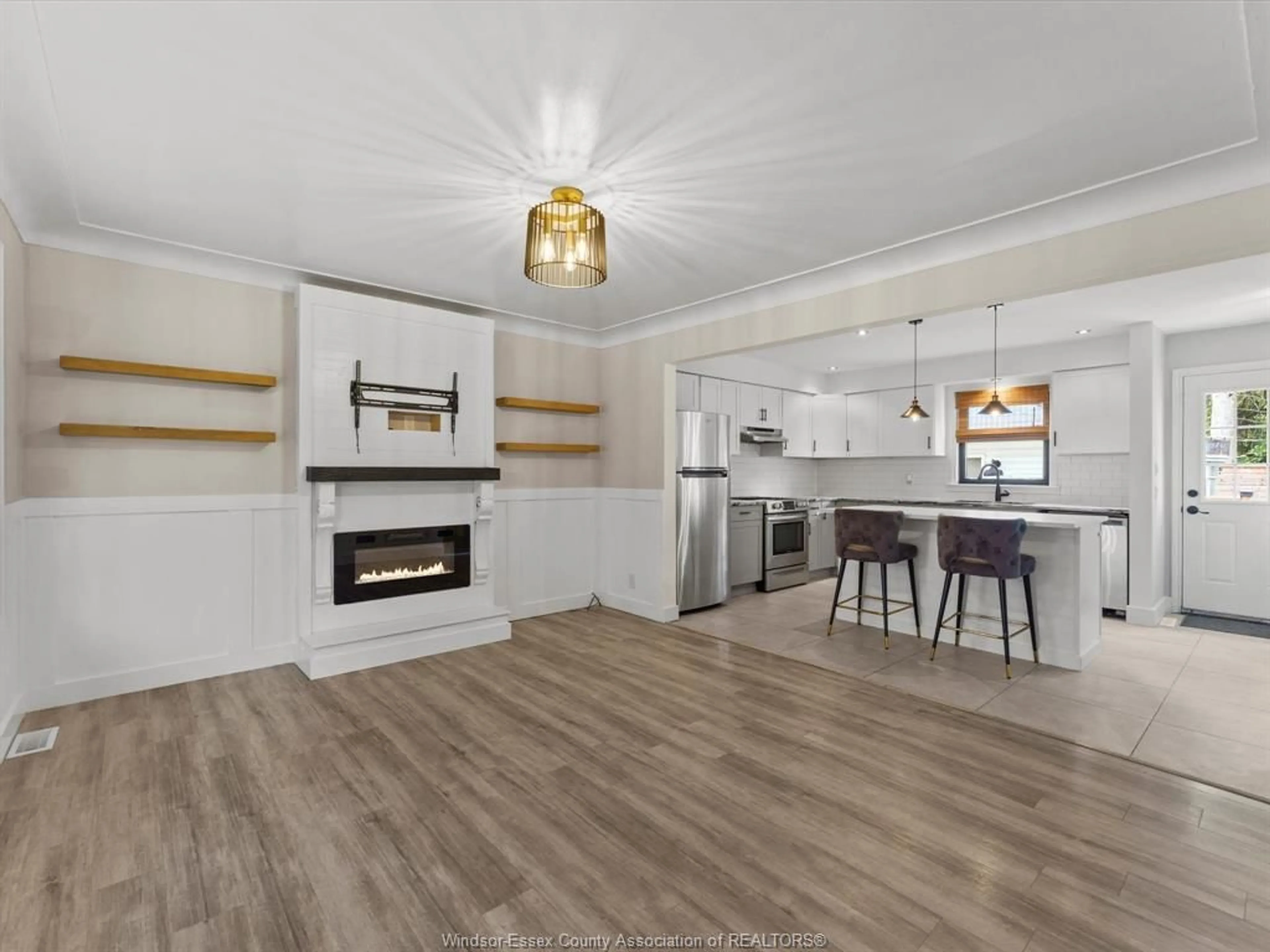 Open concept kitchen, wood/laminate floor for 1137 REEDMERE, Windsor Ontario N8S 2M2
