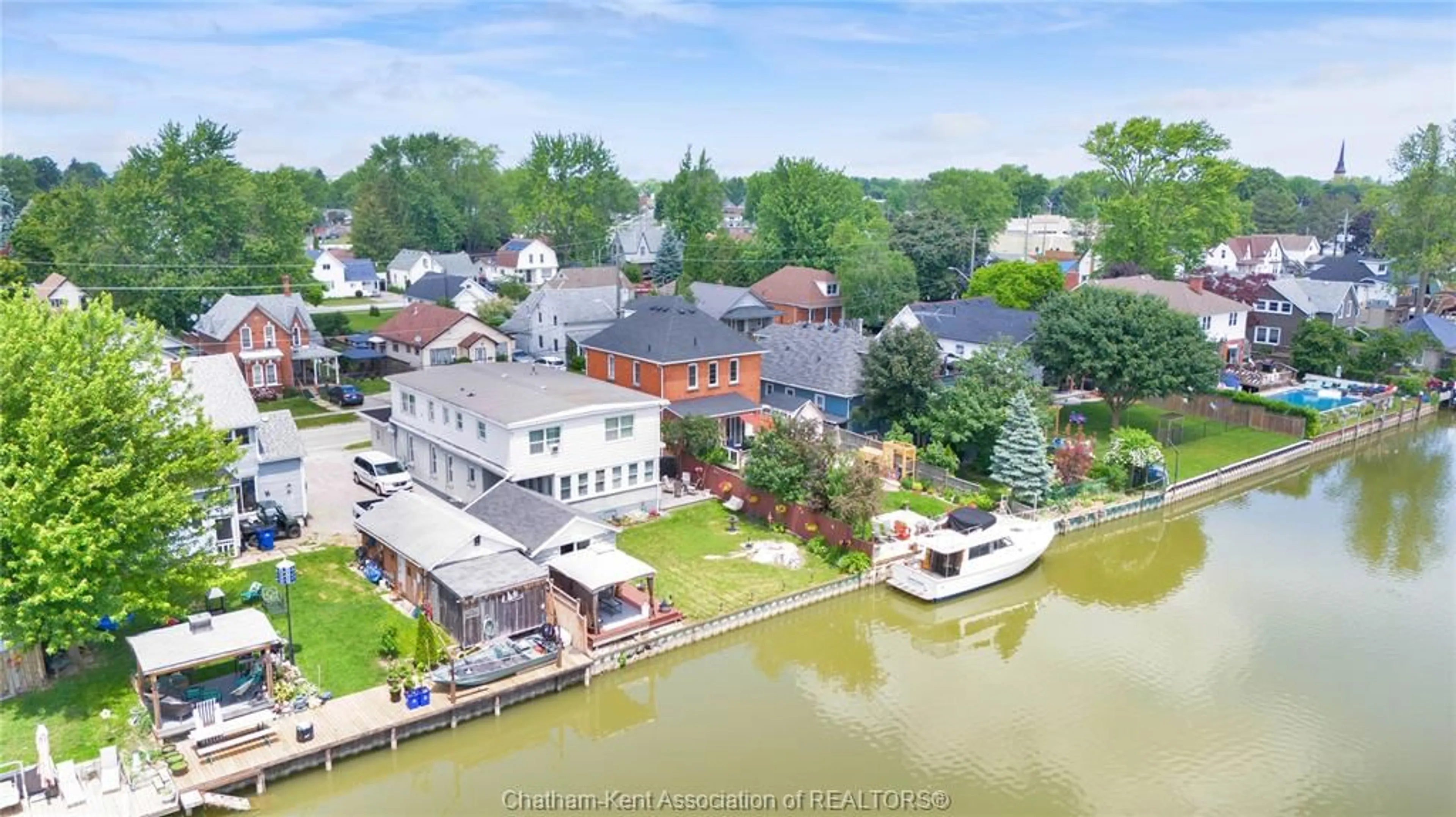 A pic from outside/outdoor area/front of a property/back of a property/a pic from drone, water/lake/river/ocean view for 1039 James St, Wallaceburg Ontario N8A 2P9