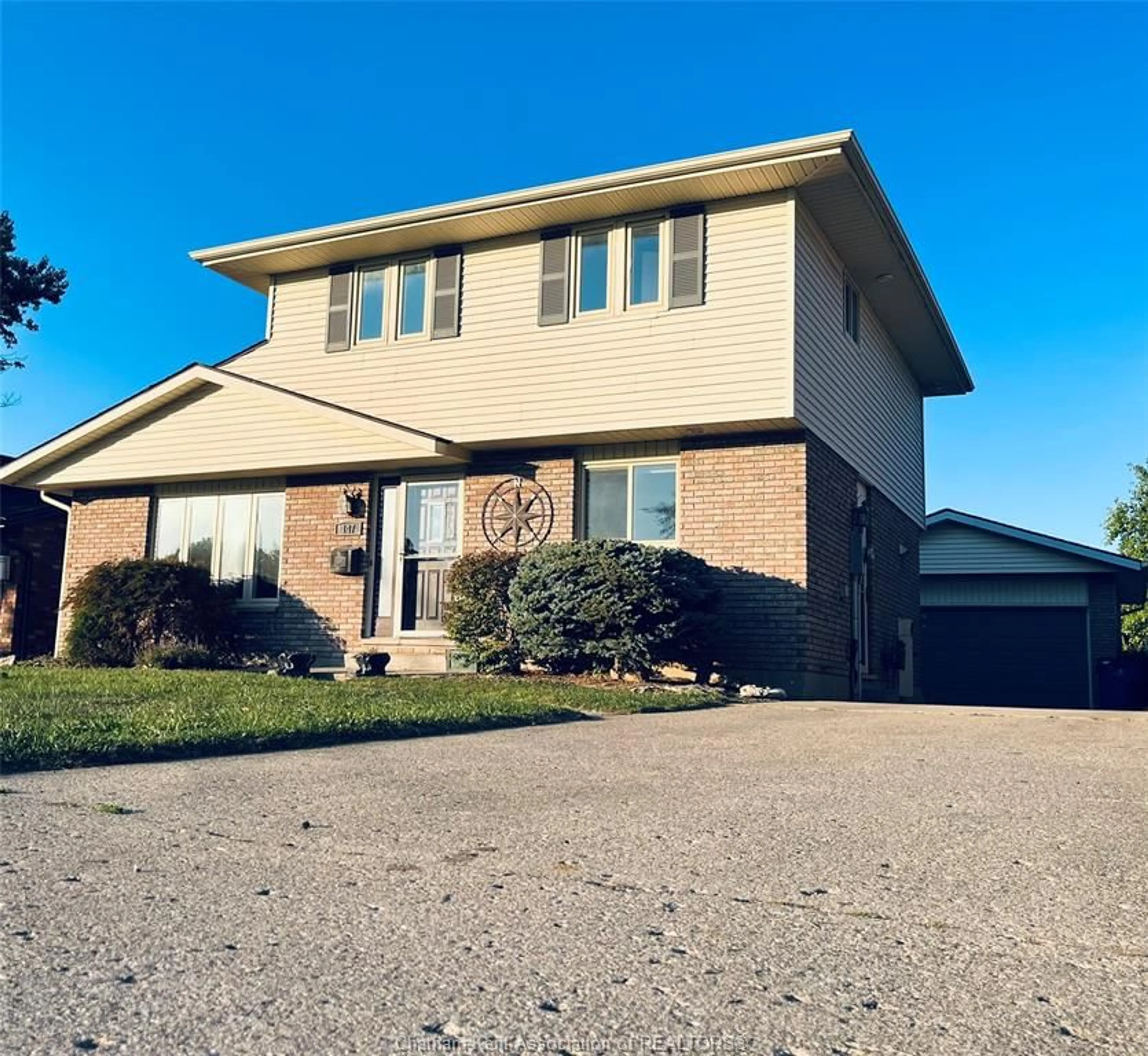 Home with brick exterior material, street for 147 St Michael Ave, Chatham Ontario N7M 6A8