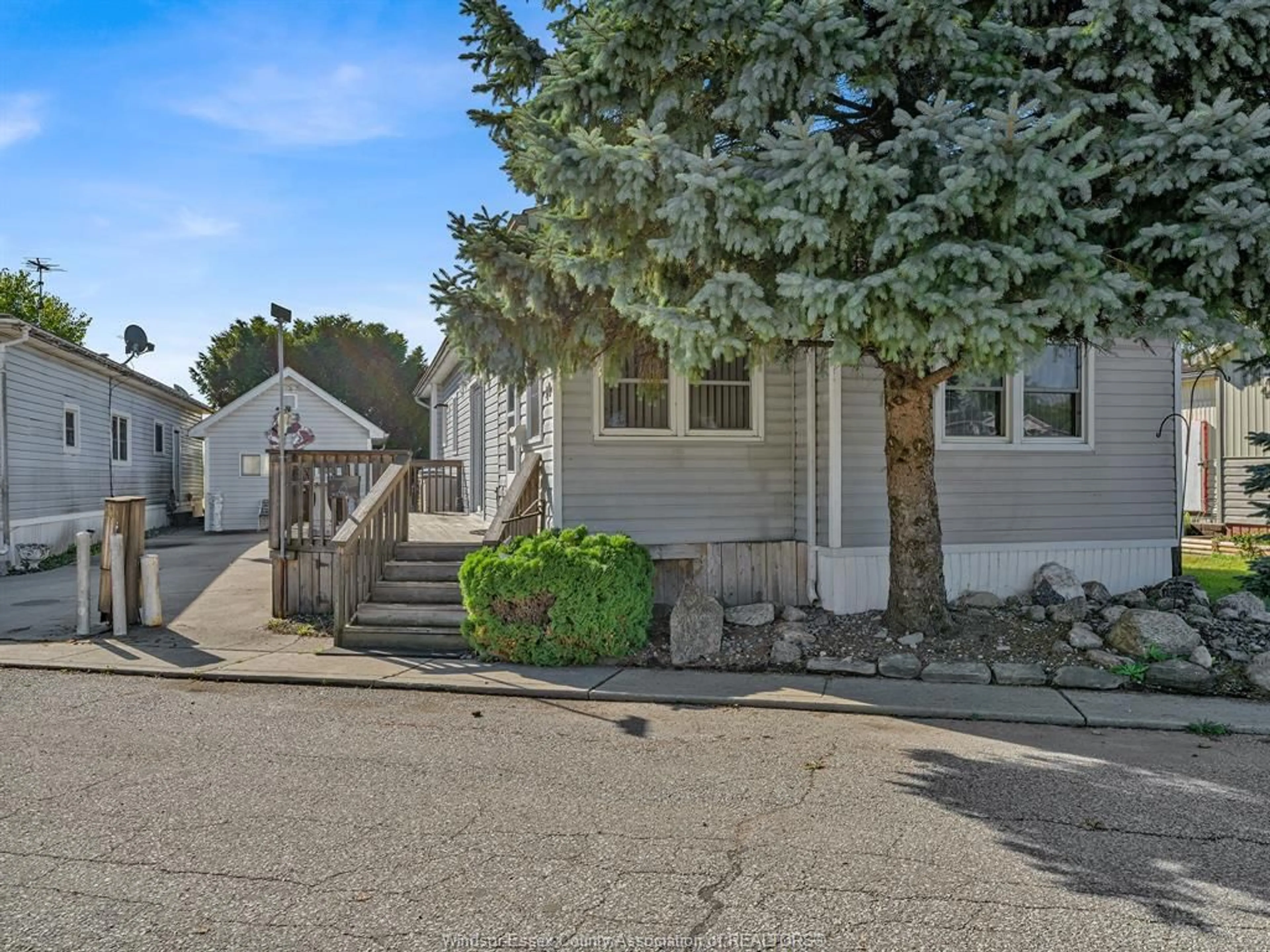 Home with vinyl exterior material, street for 49 WILDER Dr, Lakeshore Ontario N8N 2T1