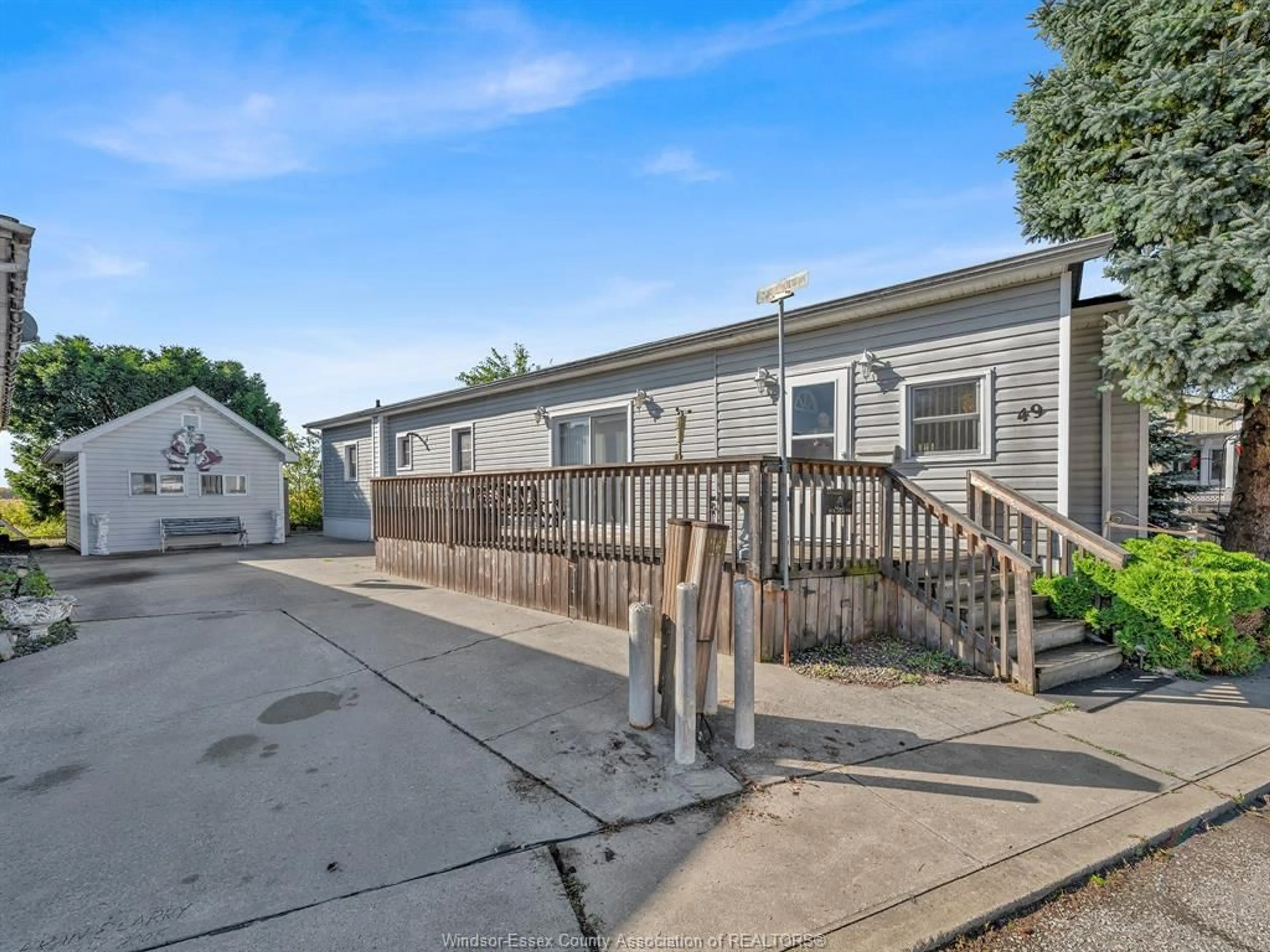 A pic from outside/outdoor area/front of a property/back of a property/a pic from drone, street for 49 WILDER Dr, Lakeshore Ontario N8N 2T1