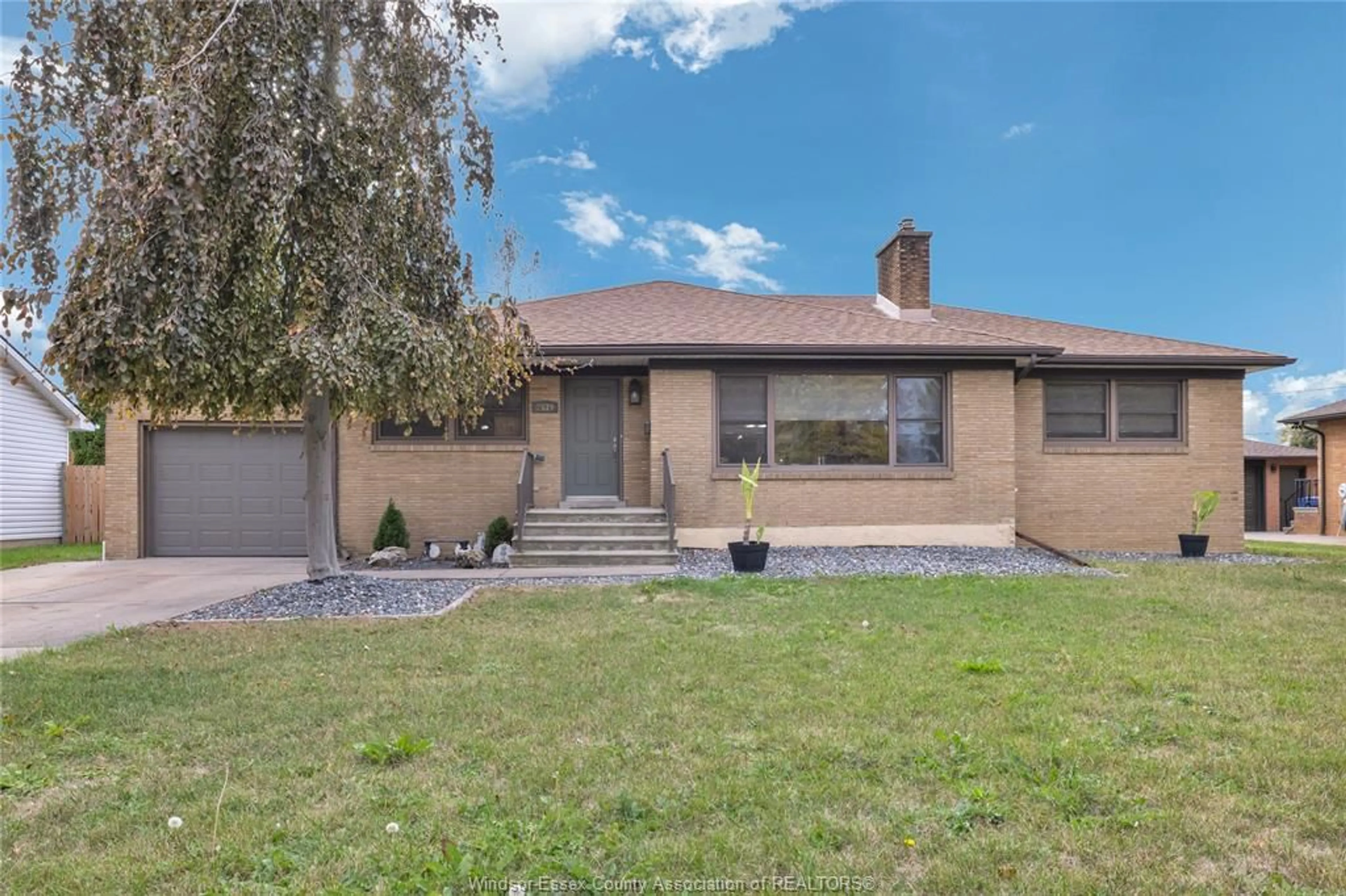 Home with brick exterior material, street for 2539 Alexandra, Windsor Ontario N9E 2J4