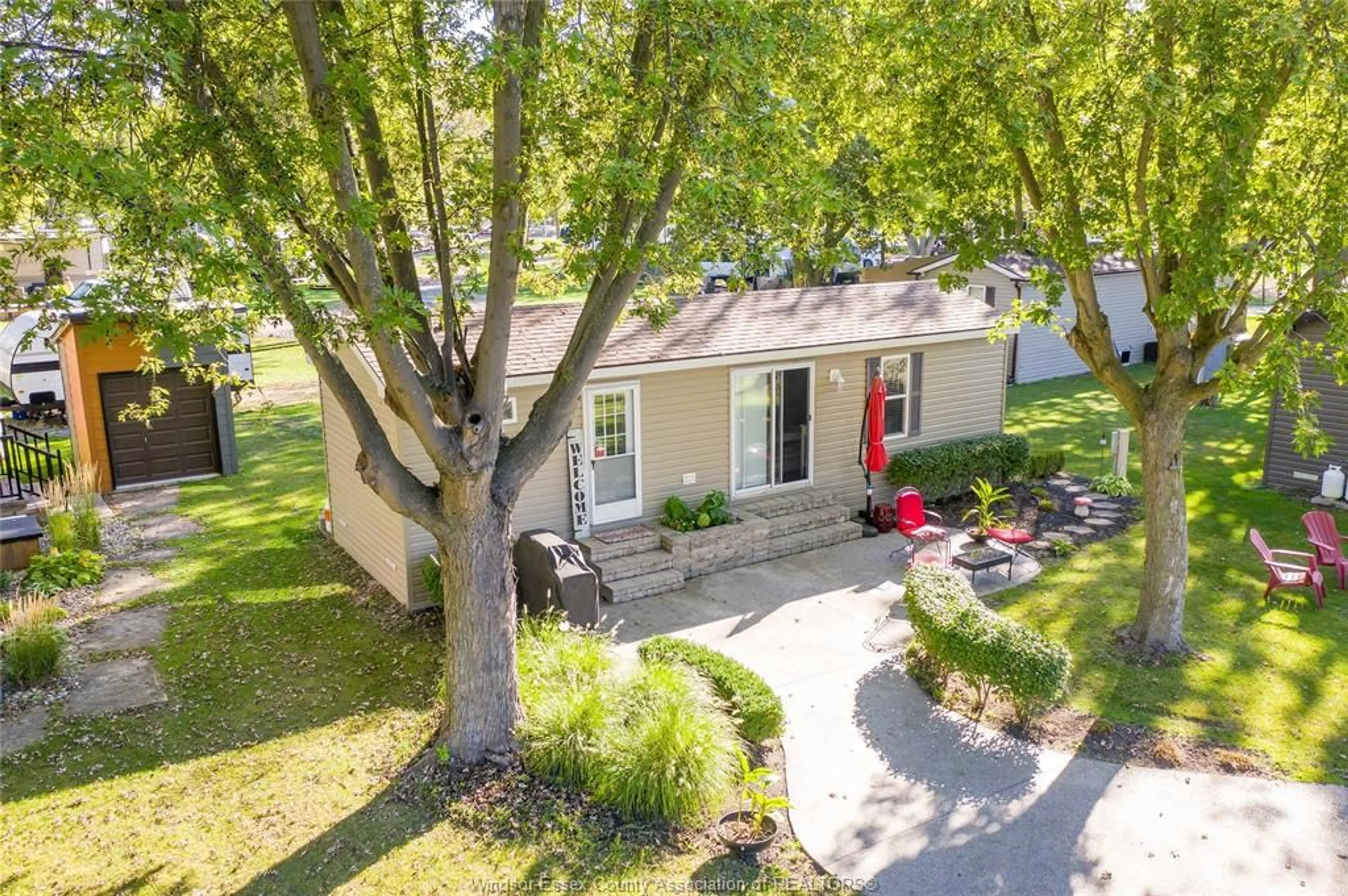 A pic from outside/outdoor area/front of a property/back of a property/a pic from drone, street for 981 COUNTY RD. 2 #535, Lakeshore Ontario N8L 1B4