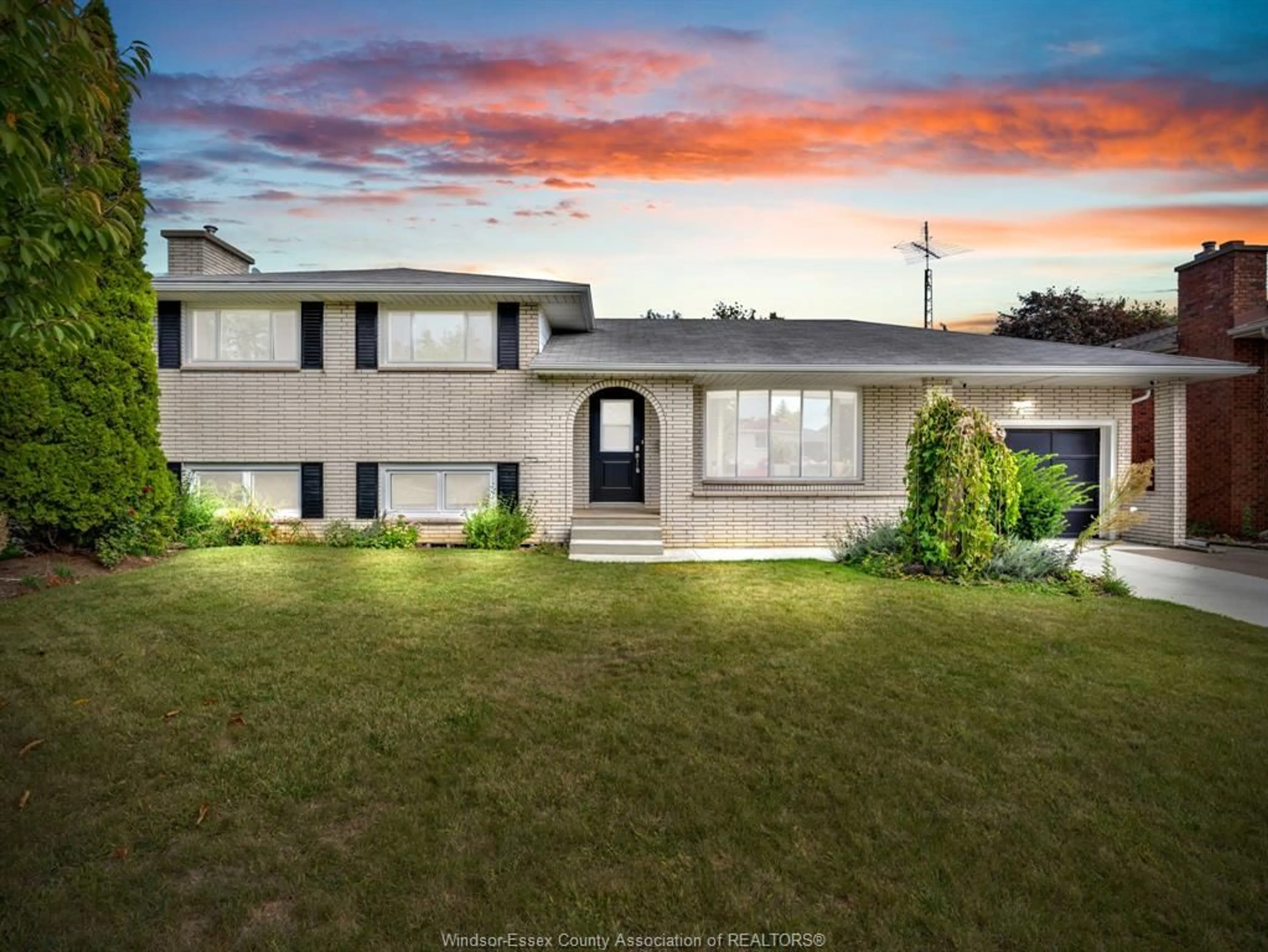 Home with vinyl exterior material, street for 26 Debergh Ave, Leamington Ontario N8H 4S9