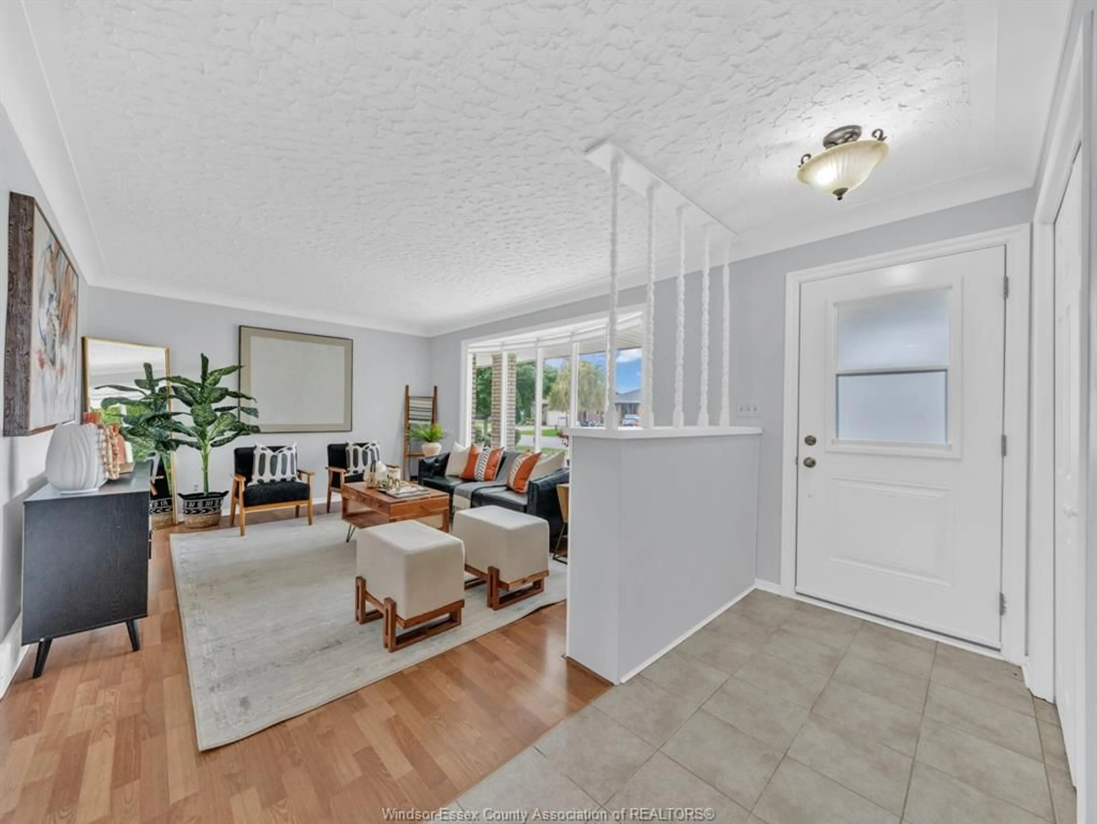 Living room with furniture, unknown for 26 Debergh Ave, Leamington Ontario N8H 4S9