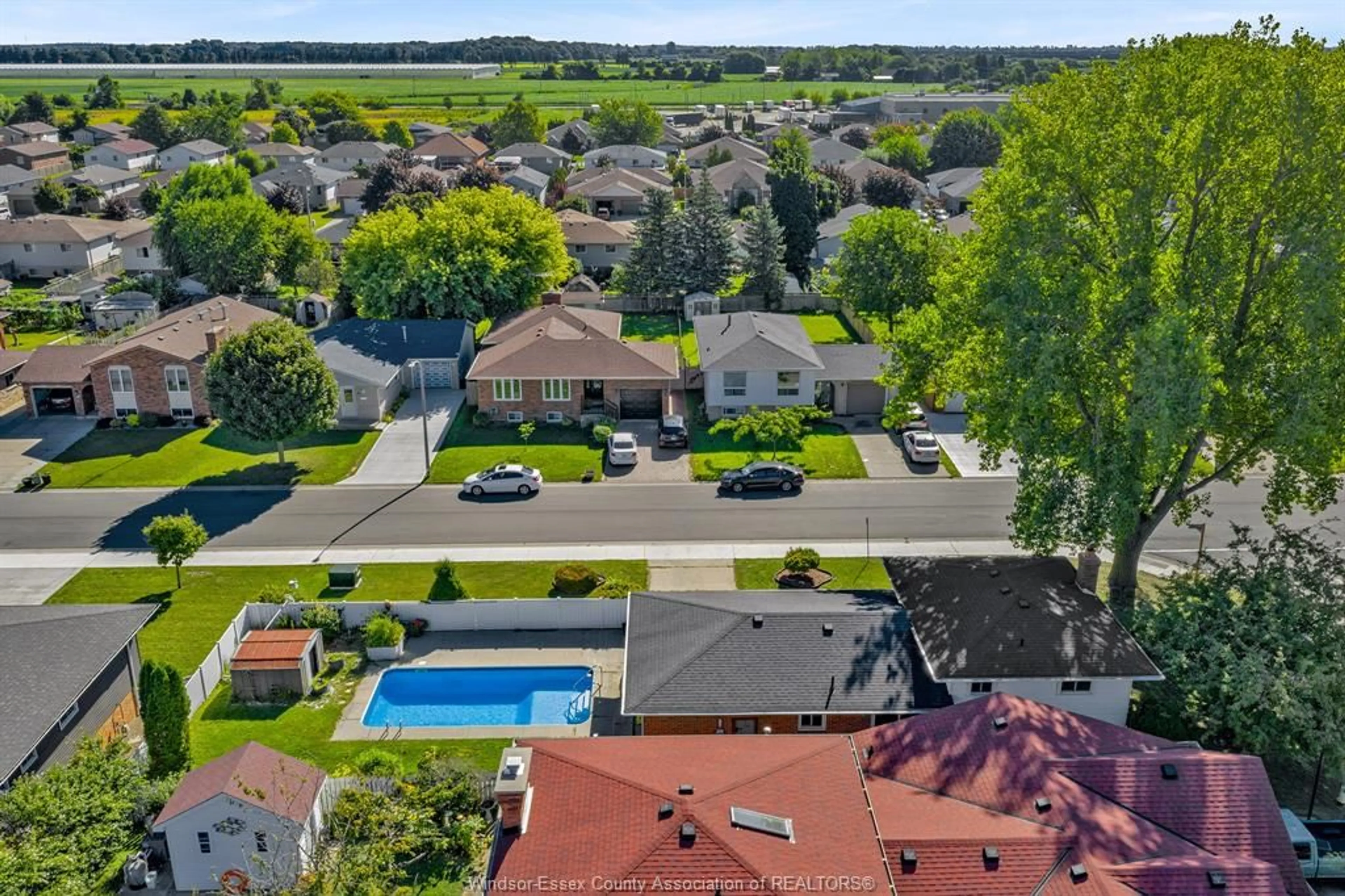 A pic from outside/outdoor area/front of a property/back of a property/a pic from drone, water/lake/river/ocean view for 23 Camelot Ave, Leamington Ontario N8H 4T7