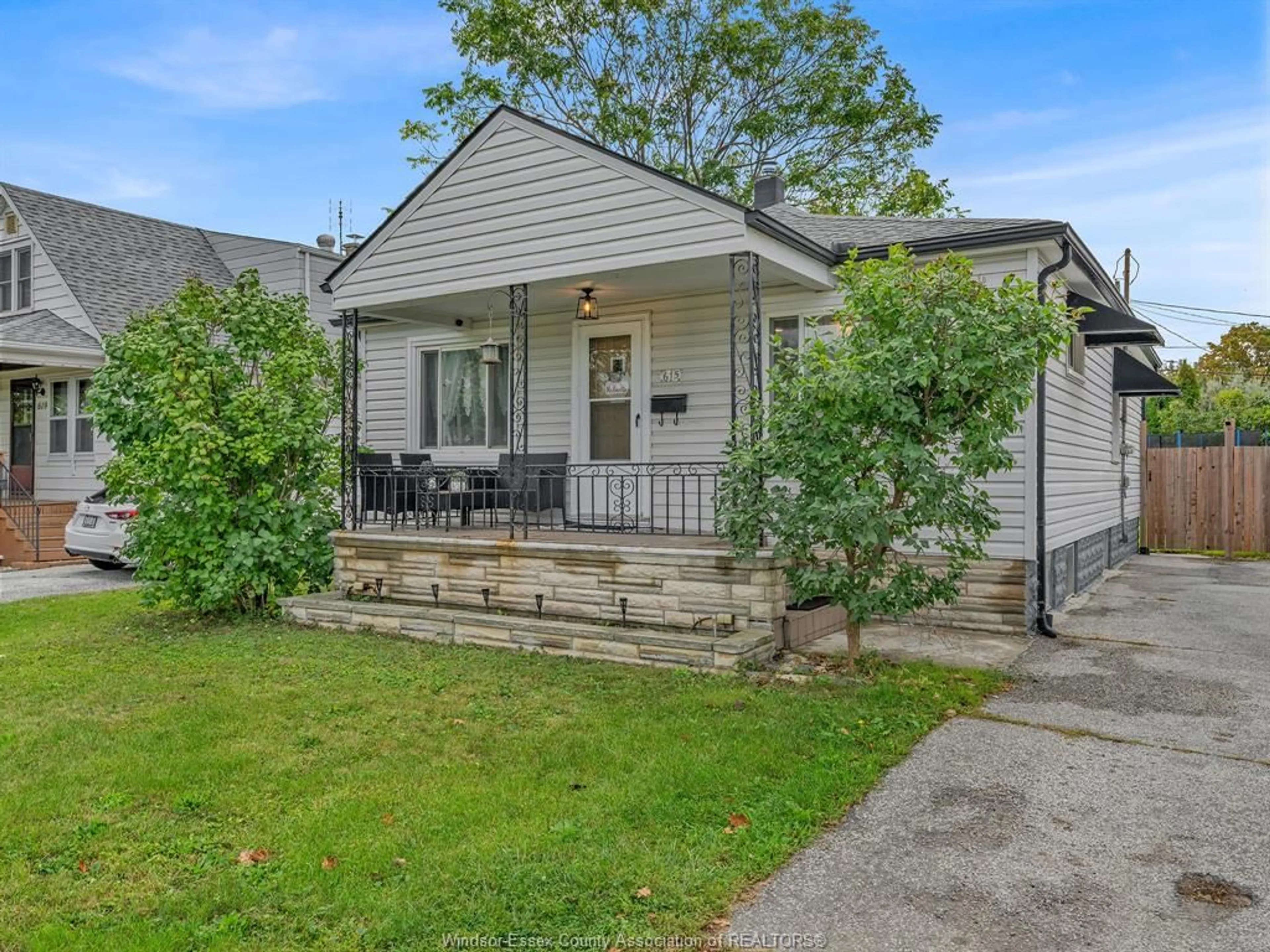 Home with vinyl exterior material, street for 615 BENSETTE St, Windsor Ontario N8X 2Y8