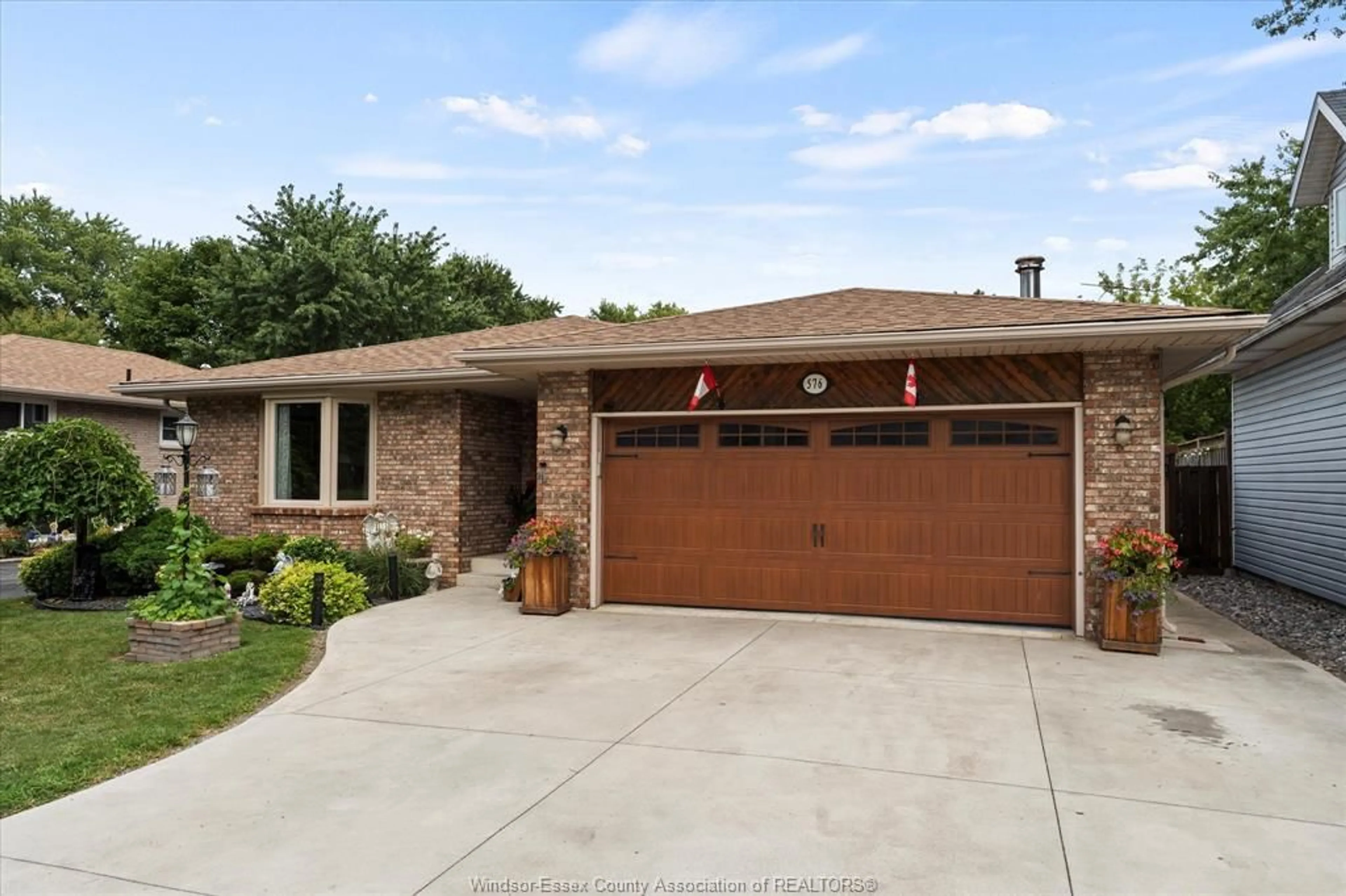 Home with brick exterior material, street for 576 Lesperance, Tecumseh Ontario N8N 1W4