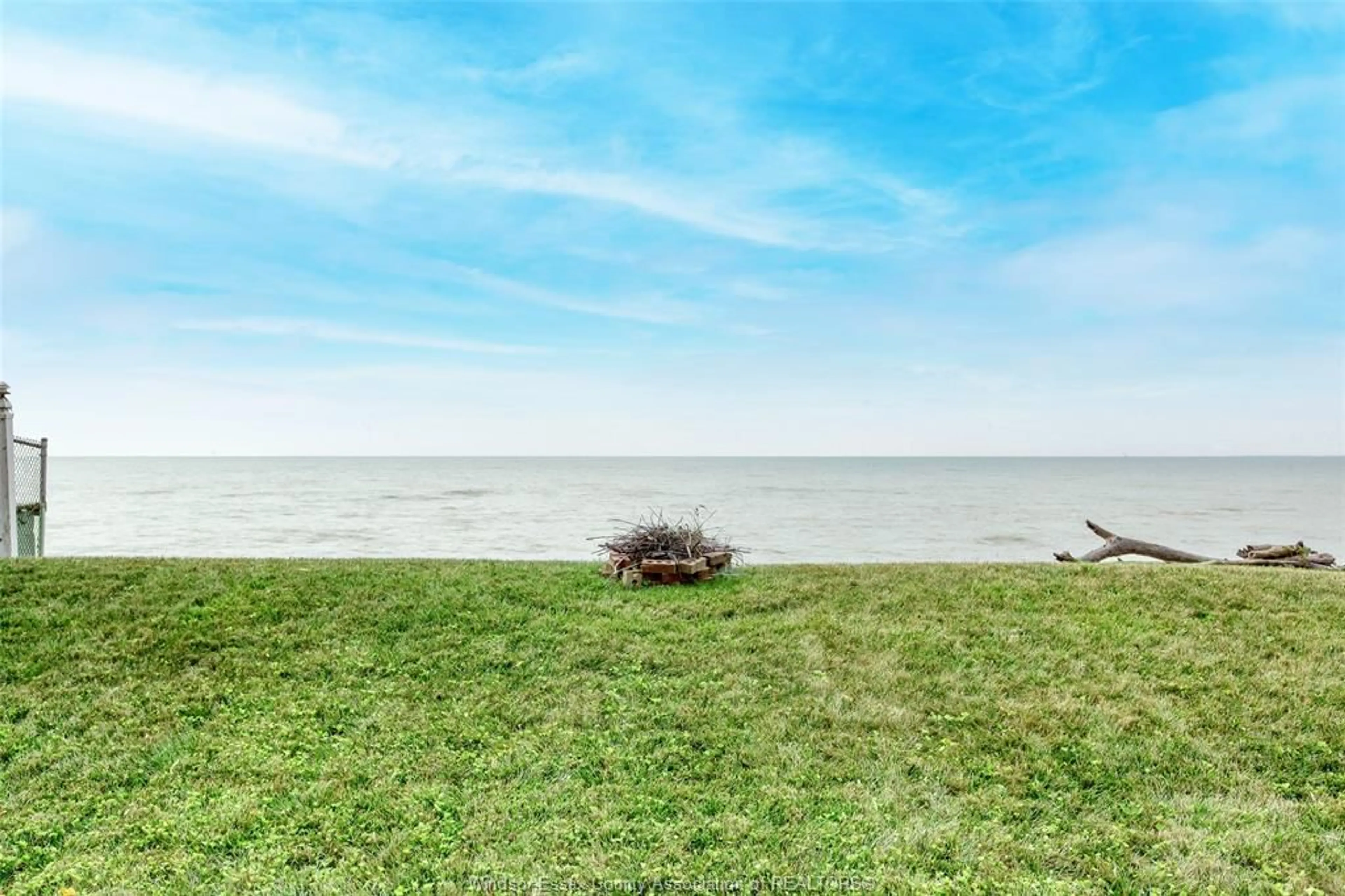 A pic from outside/outdoor area/front of a property/back of a property/a pic from drone, water/lake/river/ocean view for 127 LAKEWOOD Dr, Amherstburg Ontario N9V 2Y8