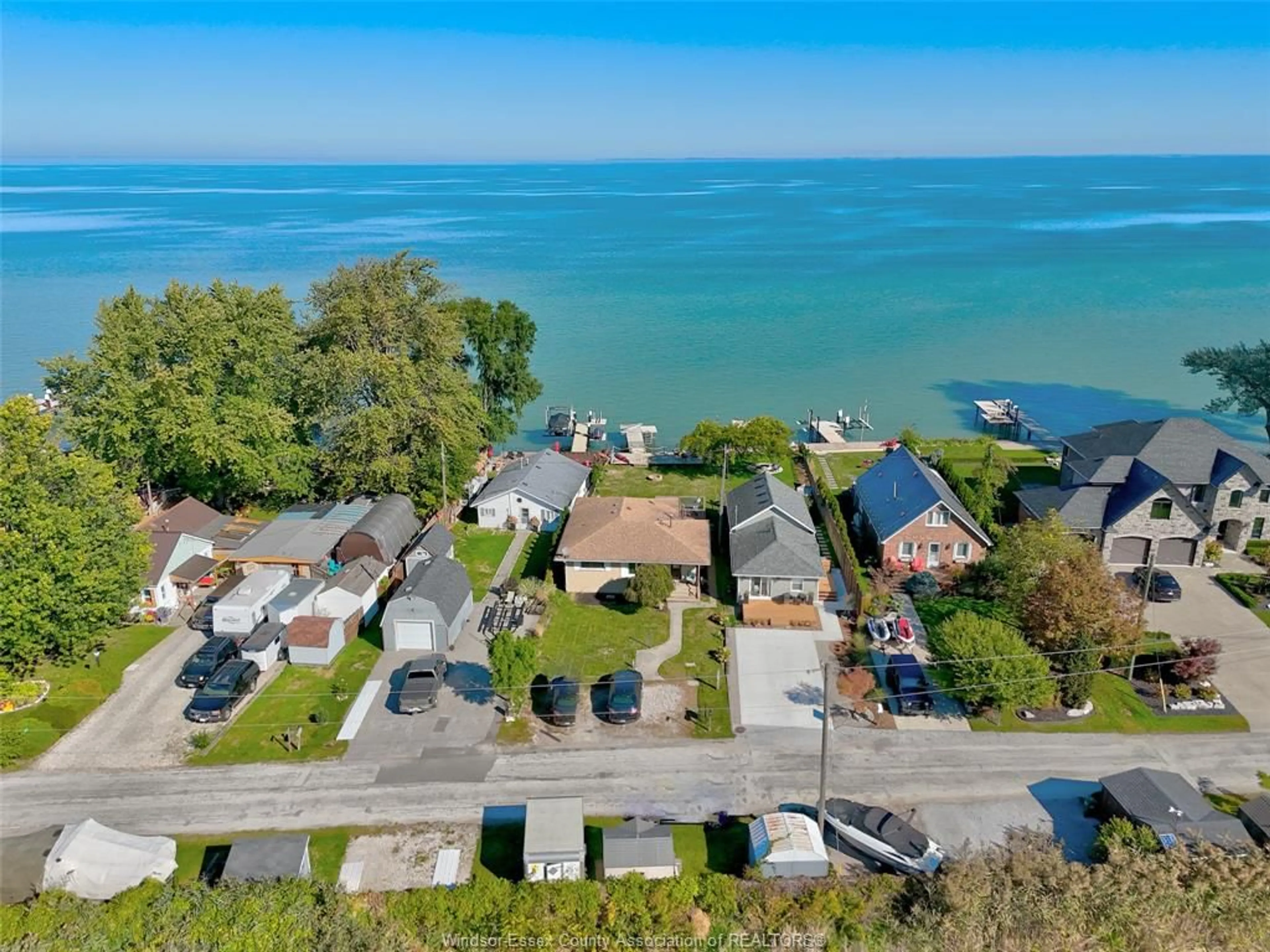A pic from outside/outdoor area/front of a property/back of a property/a pic from drone, water/lake/river/ocean view for 591 ROSS BEACH, Belle River Ontario N8L 1J6