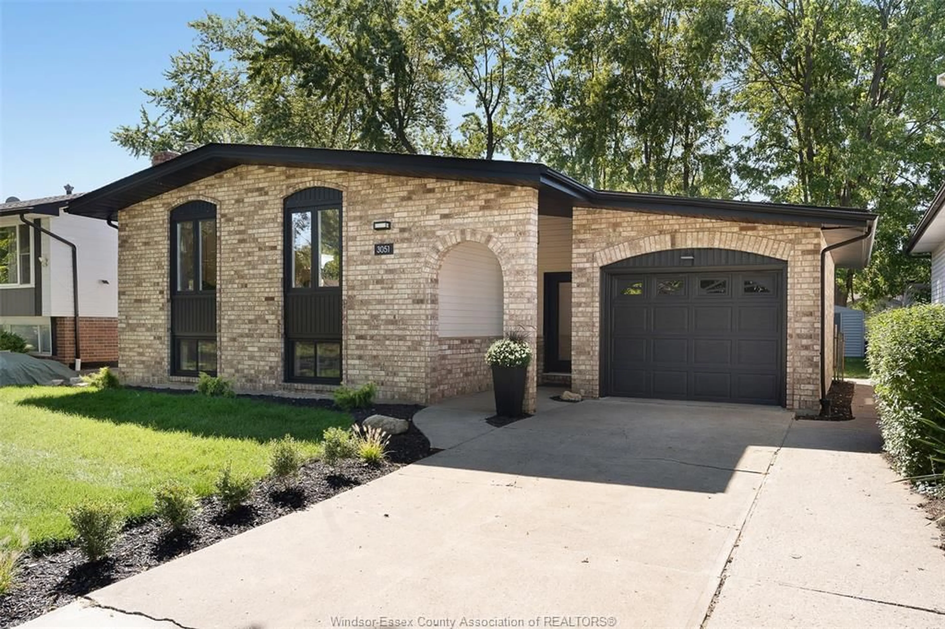Home with brick exterior material, street for 3051 Apple Lane, Windsor Ontario N8R 1K7