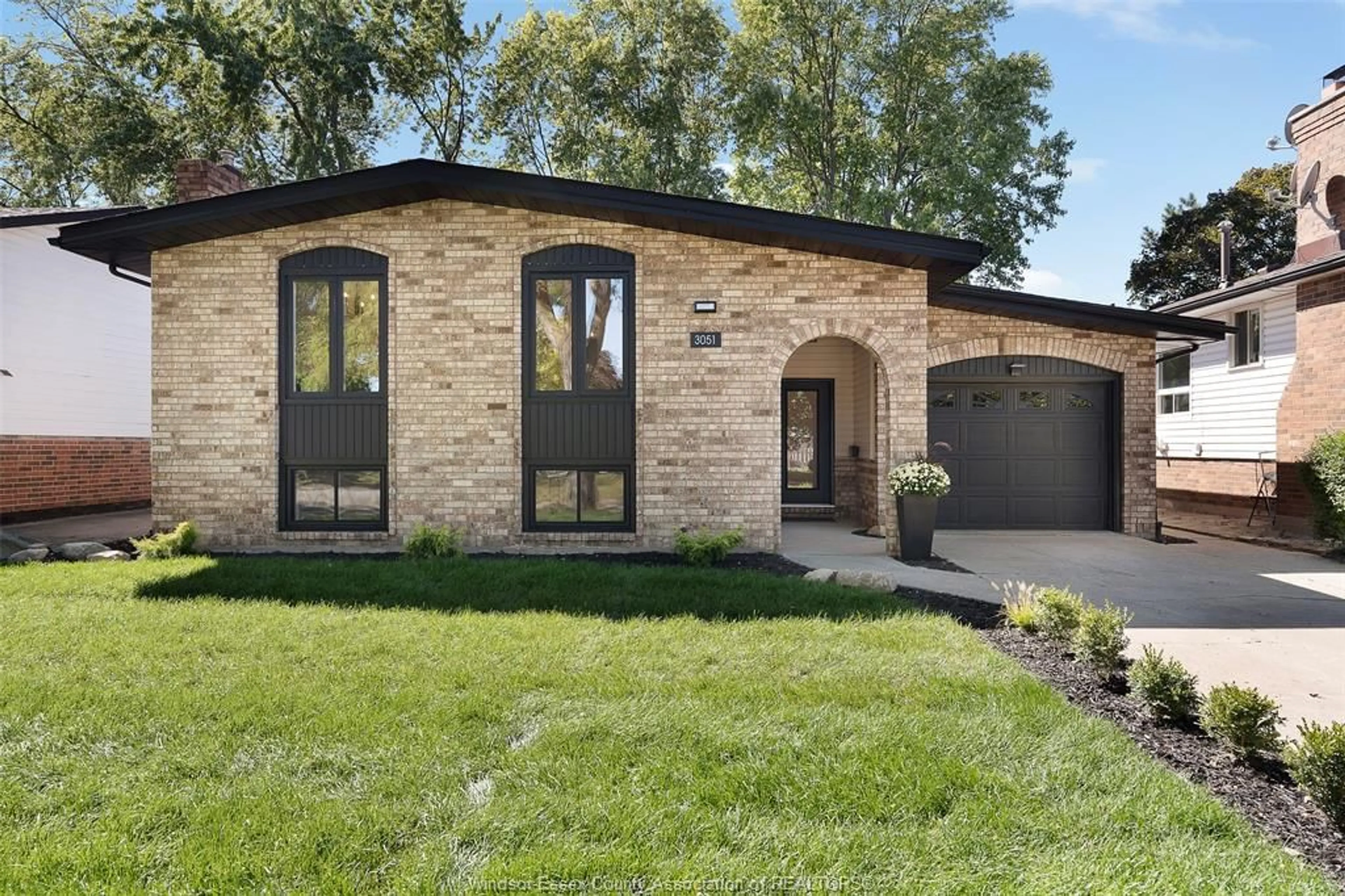 Home with brick exterior material, street for 3051 Apple Lane, Windsor Ontario N8R 1K7