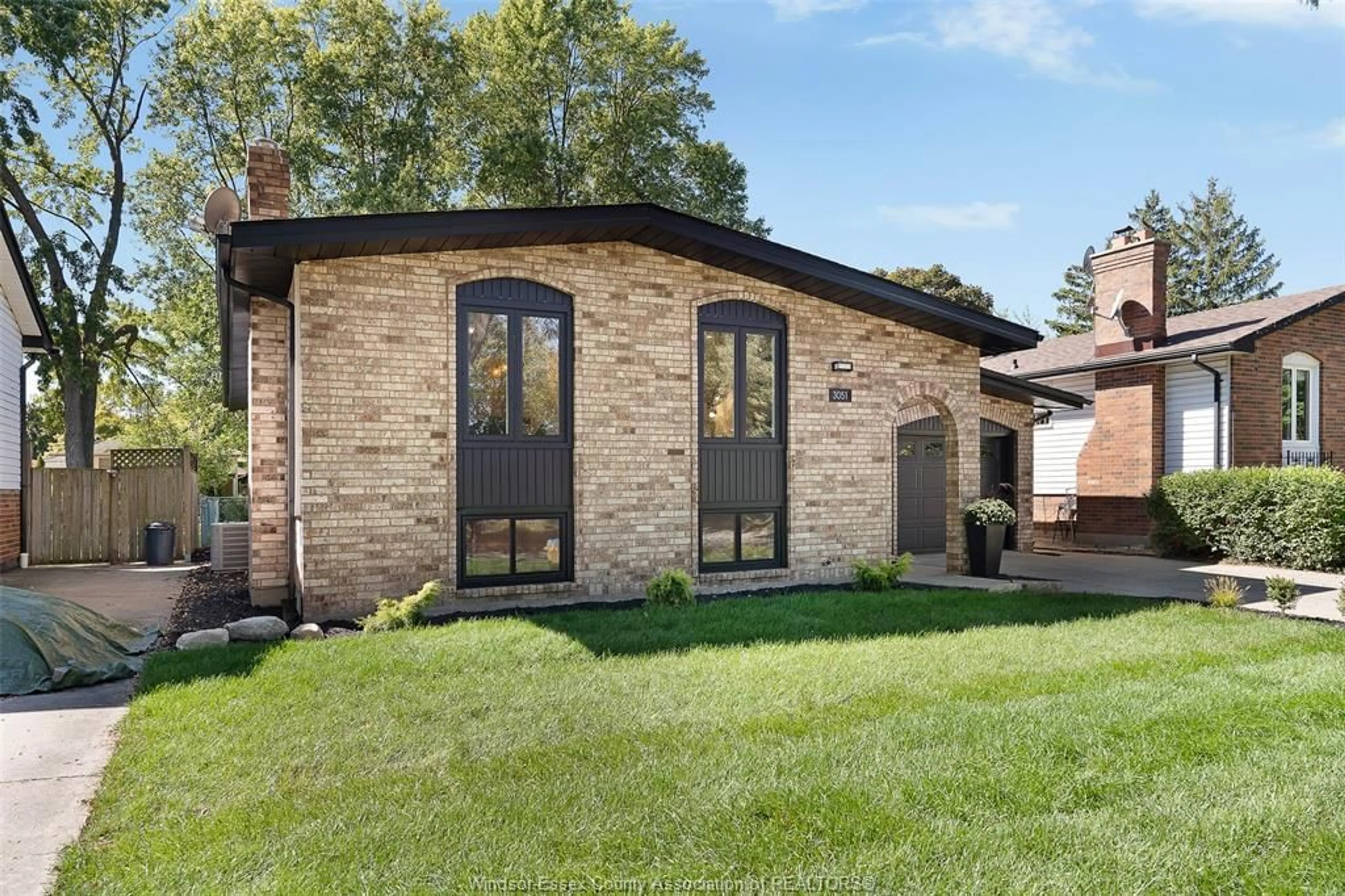 Home with brick exterior material, street for 3051 Apple Lane, Windsor Ontario N8R 1K7