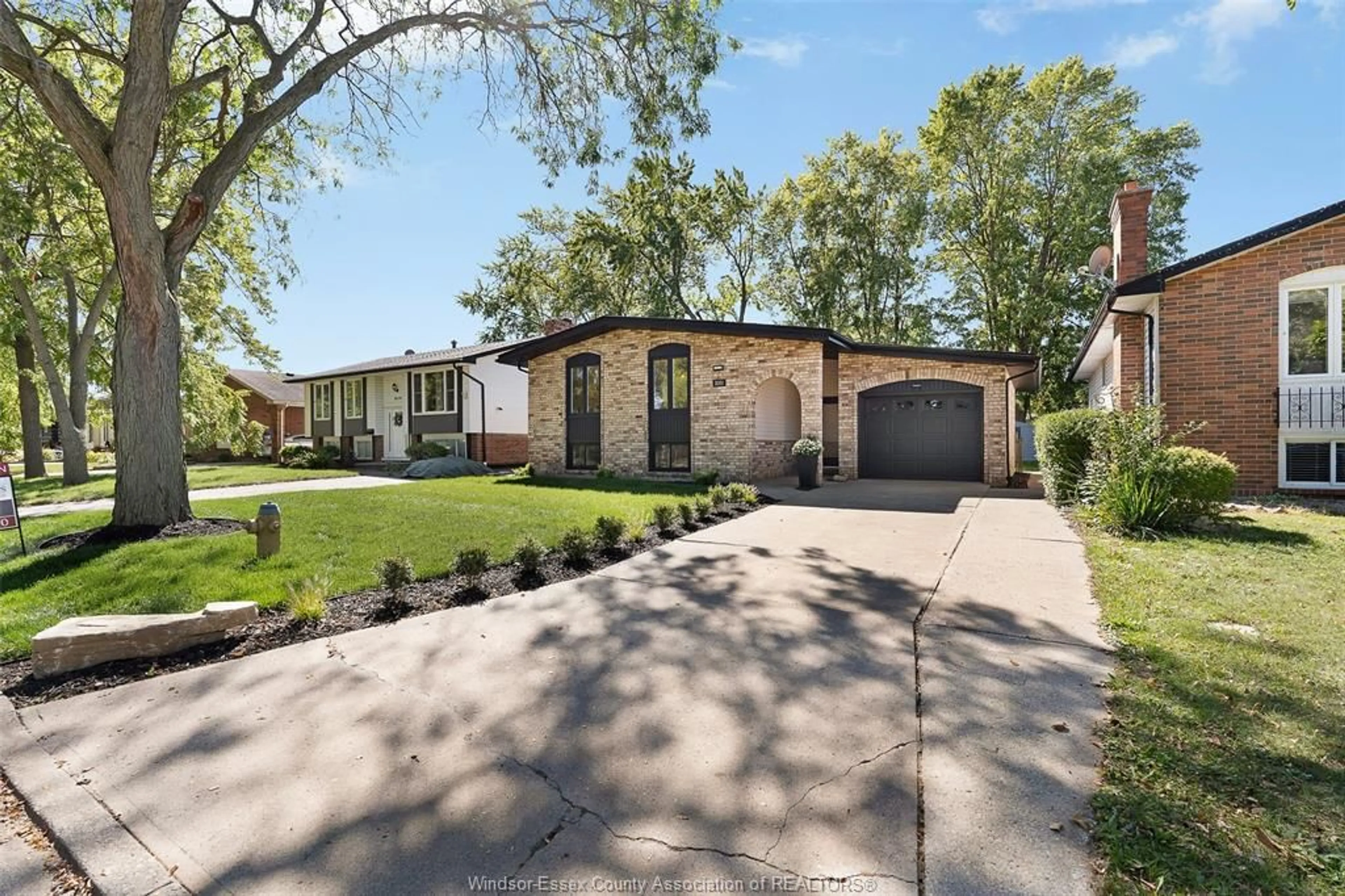 Home with brick exterior material, street for 3051 Apple Lane, Windsor Ontario N8R 1K7