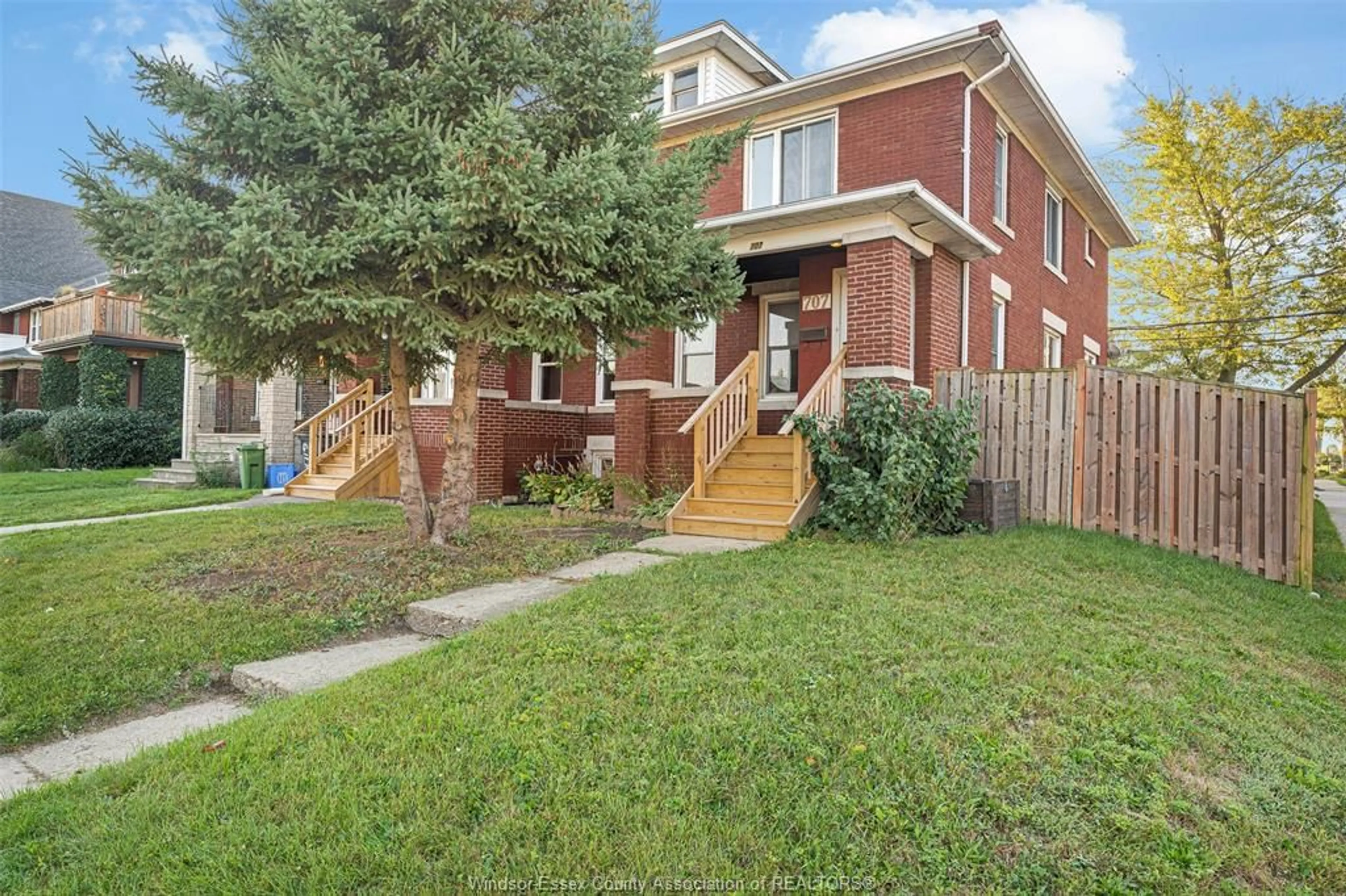 Home with brick exterior material, street for 707-715 GILES Blvd, Windsor Ontario N9A 4E5
