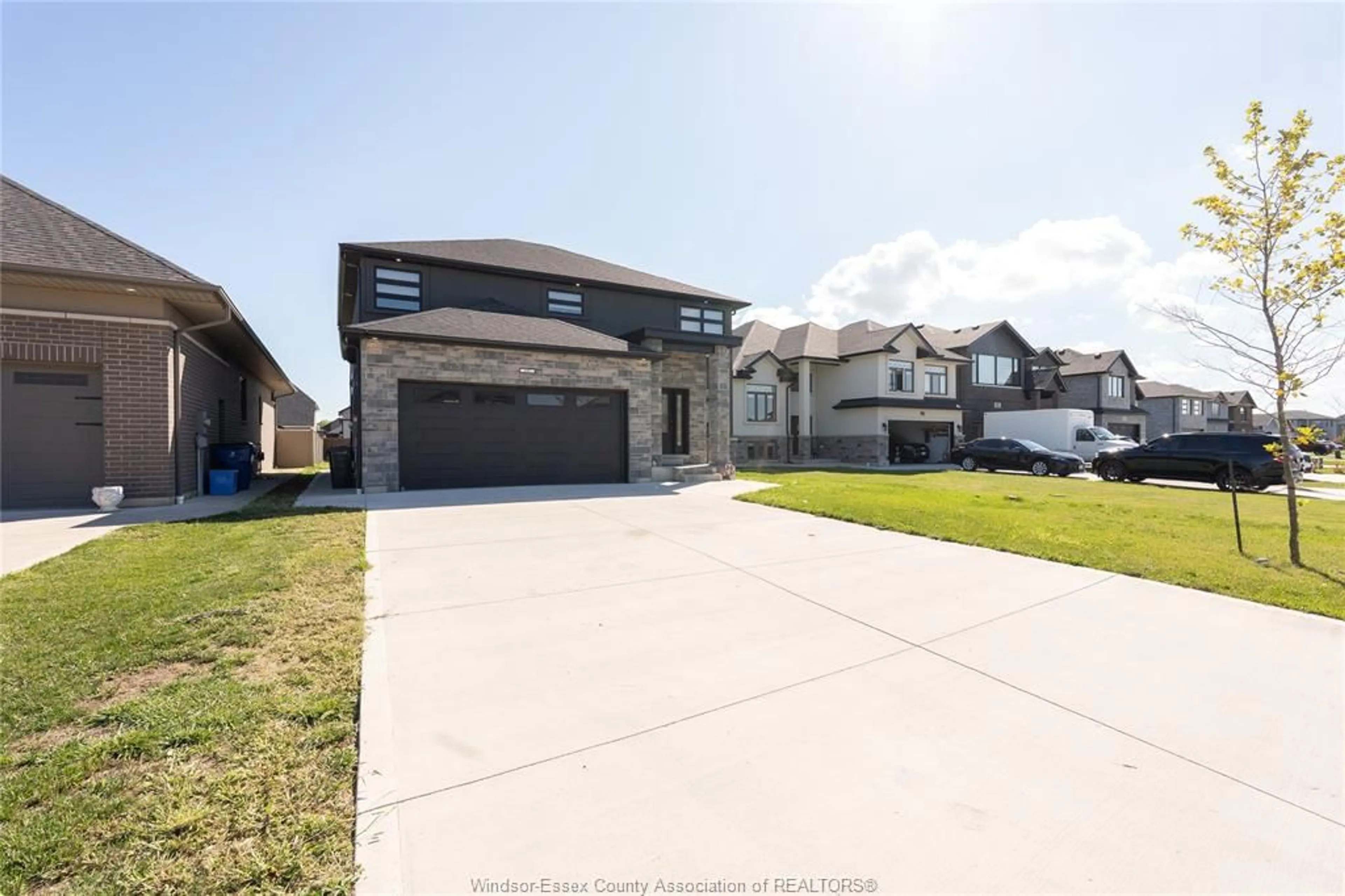 A pic from outside/outdoor area/front of a property/back of a property/a pic from drone, street for 197 SPRING, Lakeshore Ontario N8L 0G7
