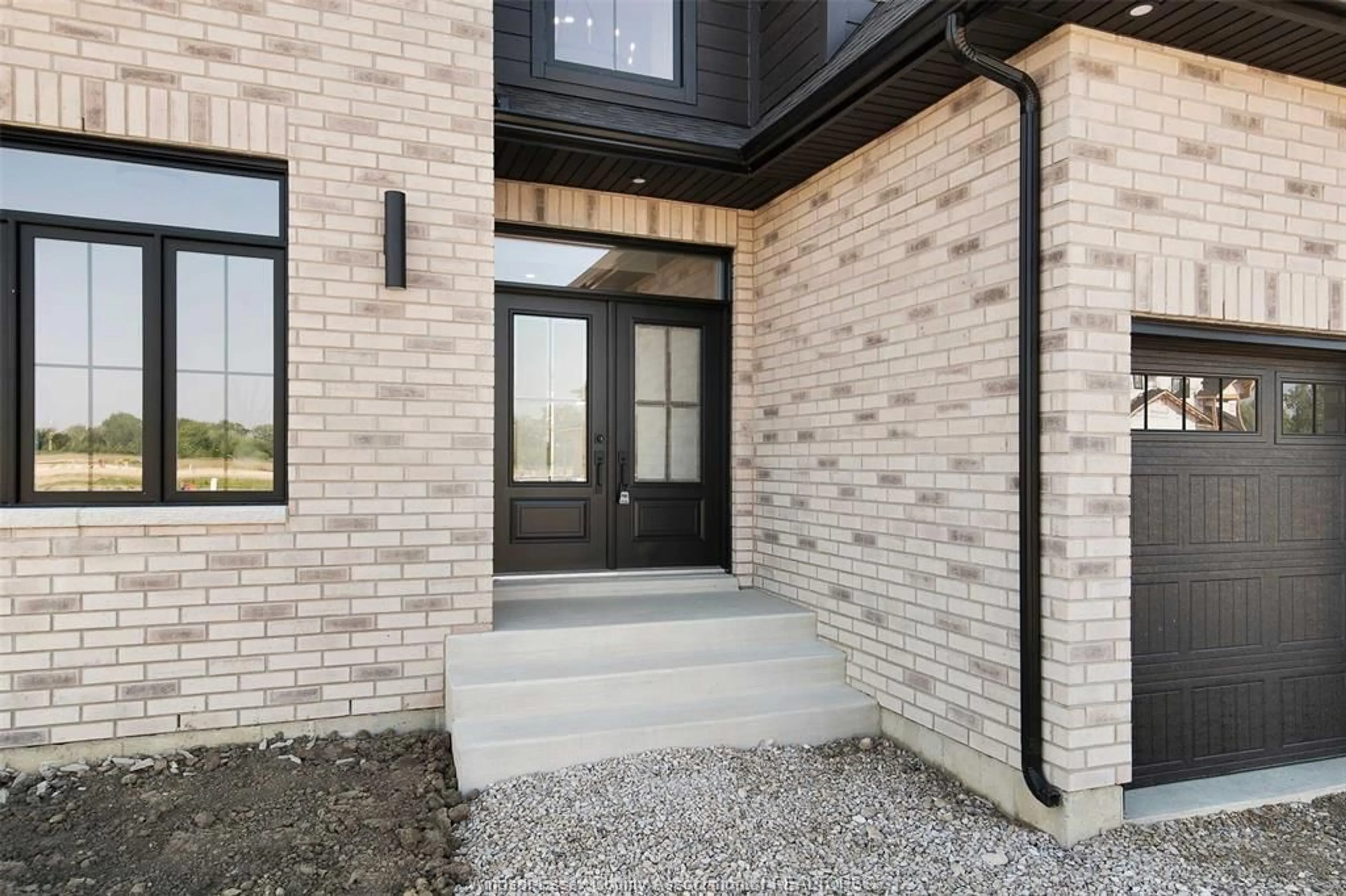 Home with brick exterior material, street for 5205 RAFAEL Rd, Tecumseh Ontario N0R 1K0