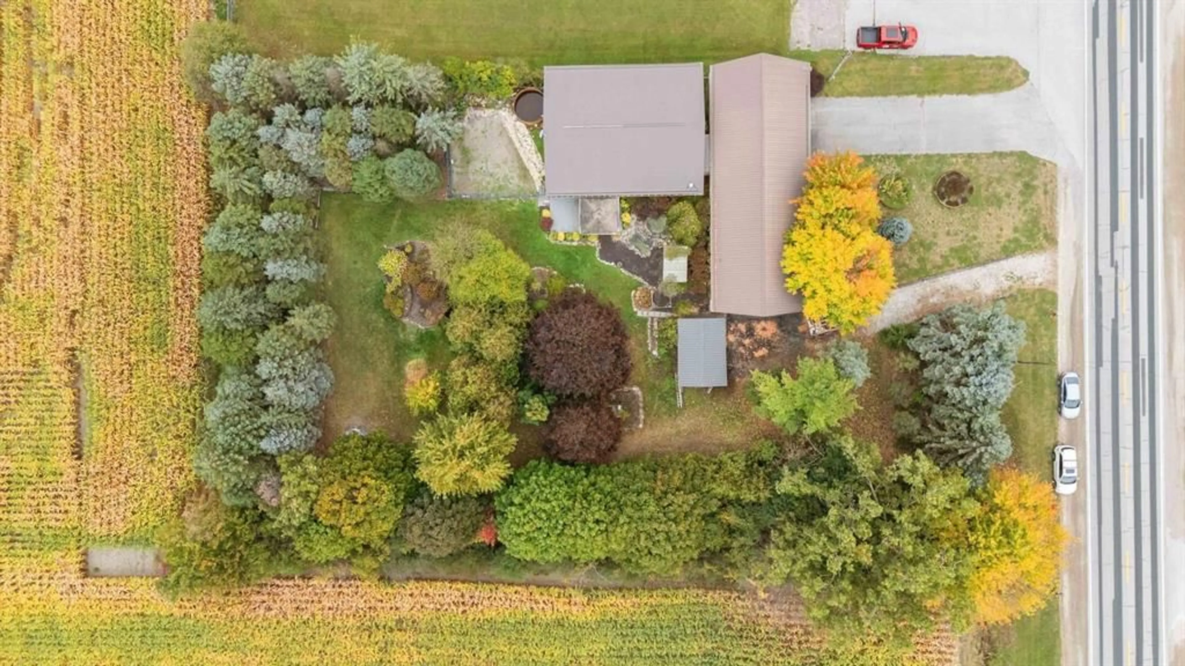 A pic from outside/outdoor area/front of a property/back of a property/a pic from drone, unknown for 3202 Petrolia Line, Enniskillen Ontario N0N 1R0