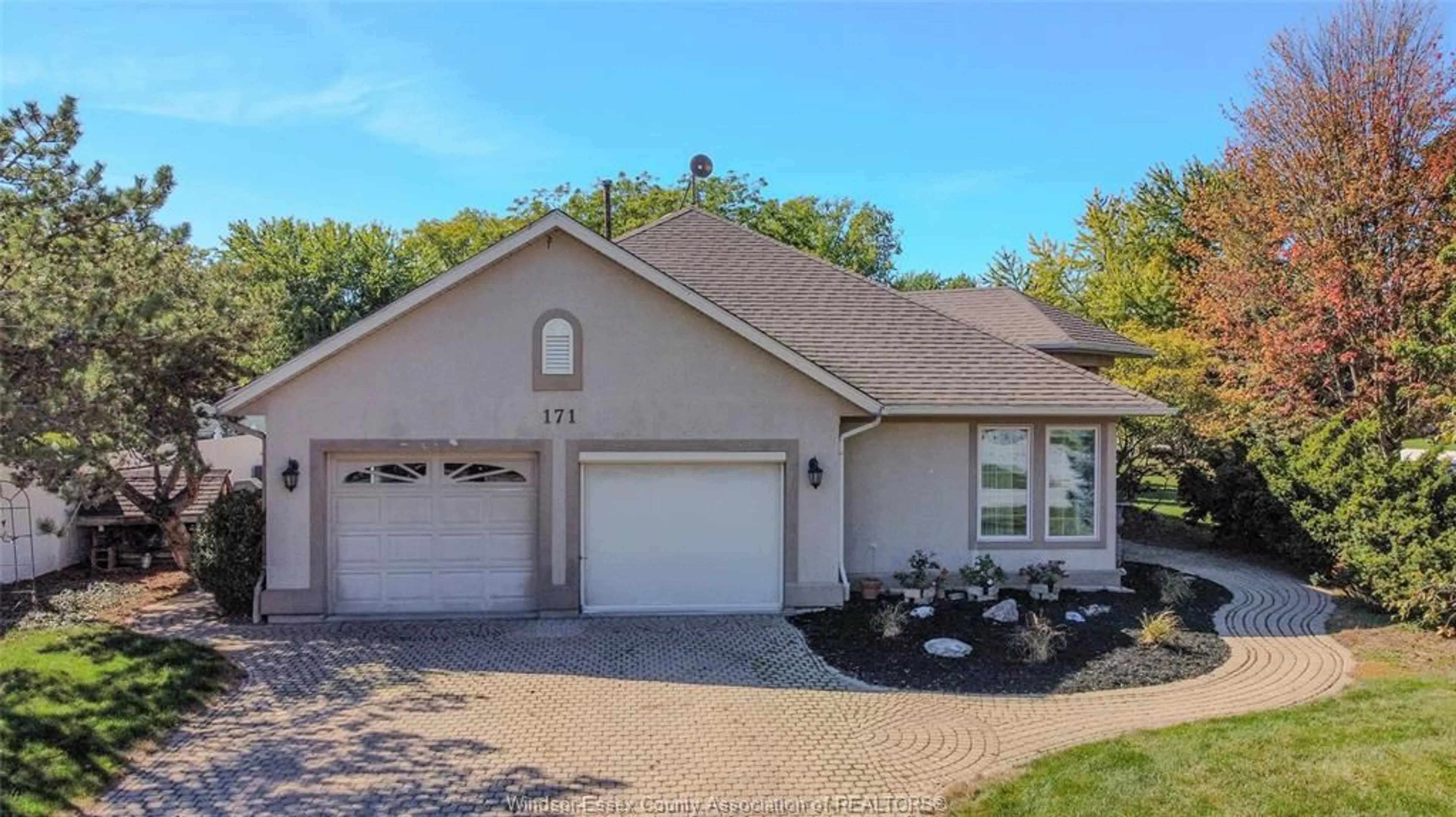 Home with vinyl exterior material, street for 171 Sparling, Belle River Ontario N0R 1A0