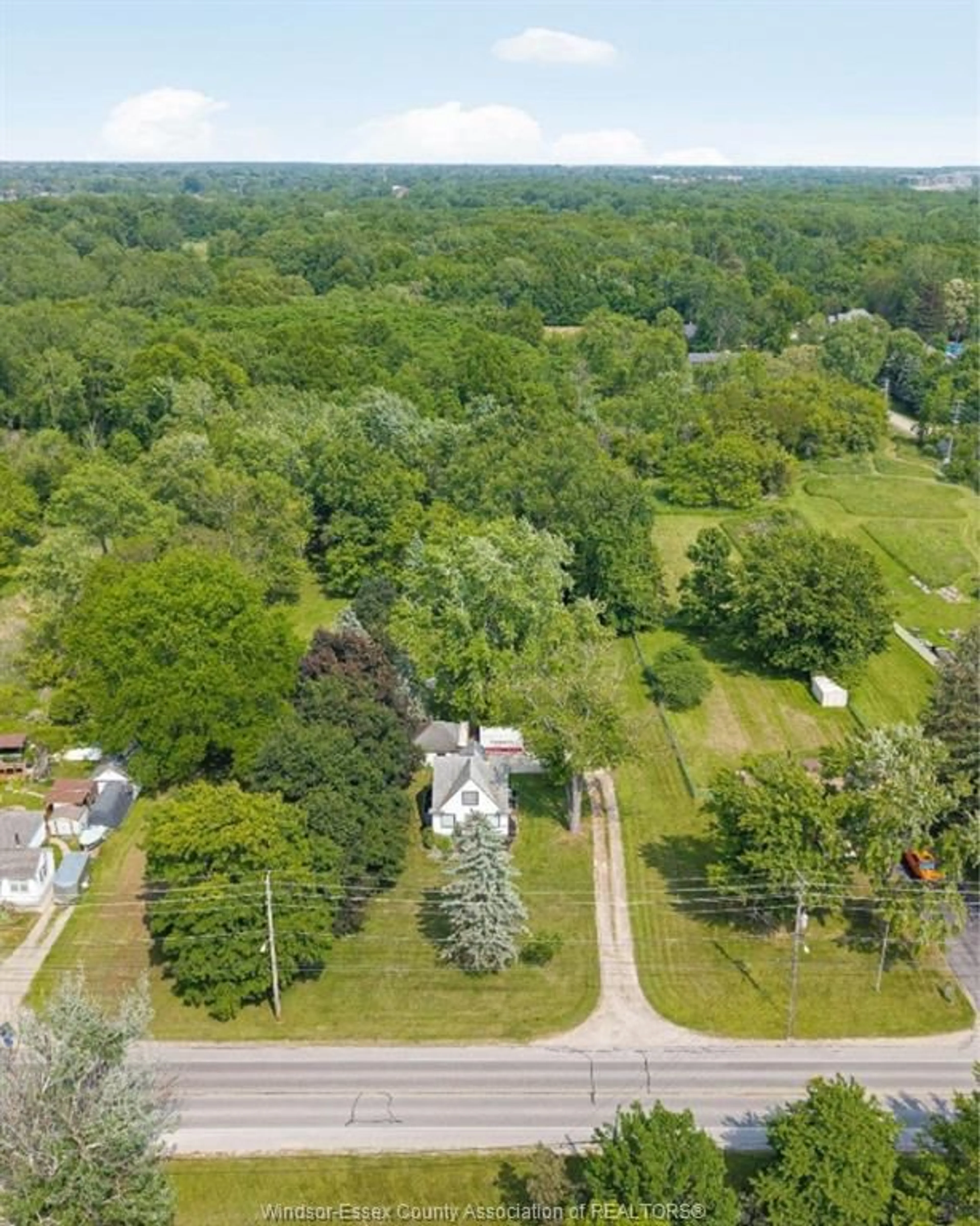 A pic from outside/outdoor area/front of a property/back of a property/a pic from drone, forest/trees view for 5411 MALDEN, Windsor Ontario N9E 3V8