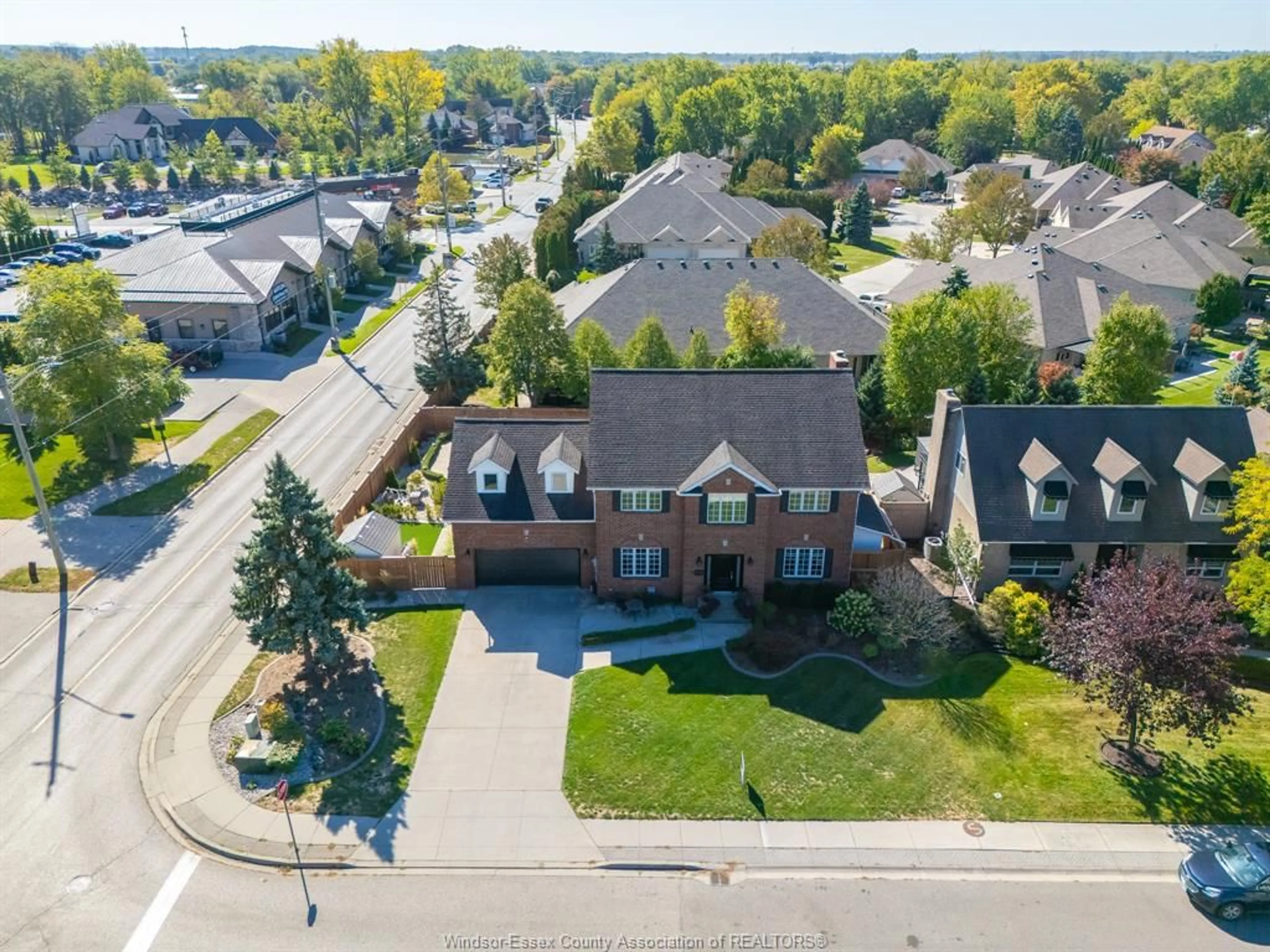 A pic from outside/outdoor area/front of a property/back of a property/a pic from drone, street for 415 BEACH GROVE Dr, Tecumseh Ontario N8N 1K6
