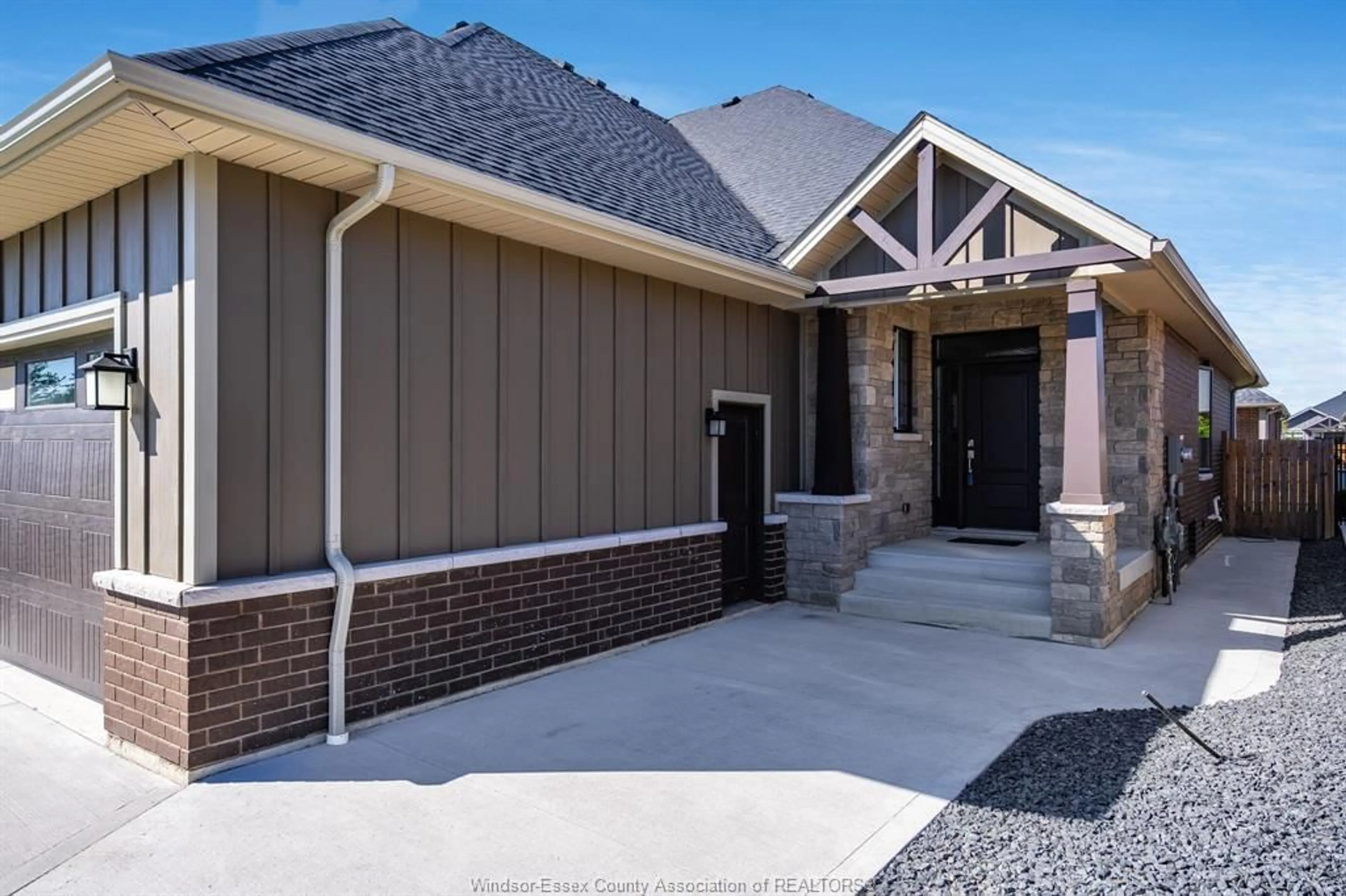 Home with brick exterior material, street for 12 Robin Crt, Kingsville Ontario N9Y 0E1