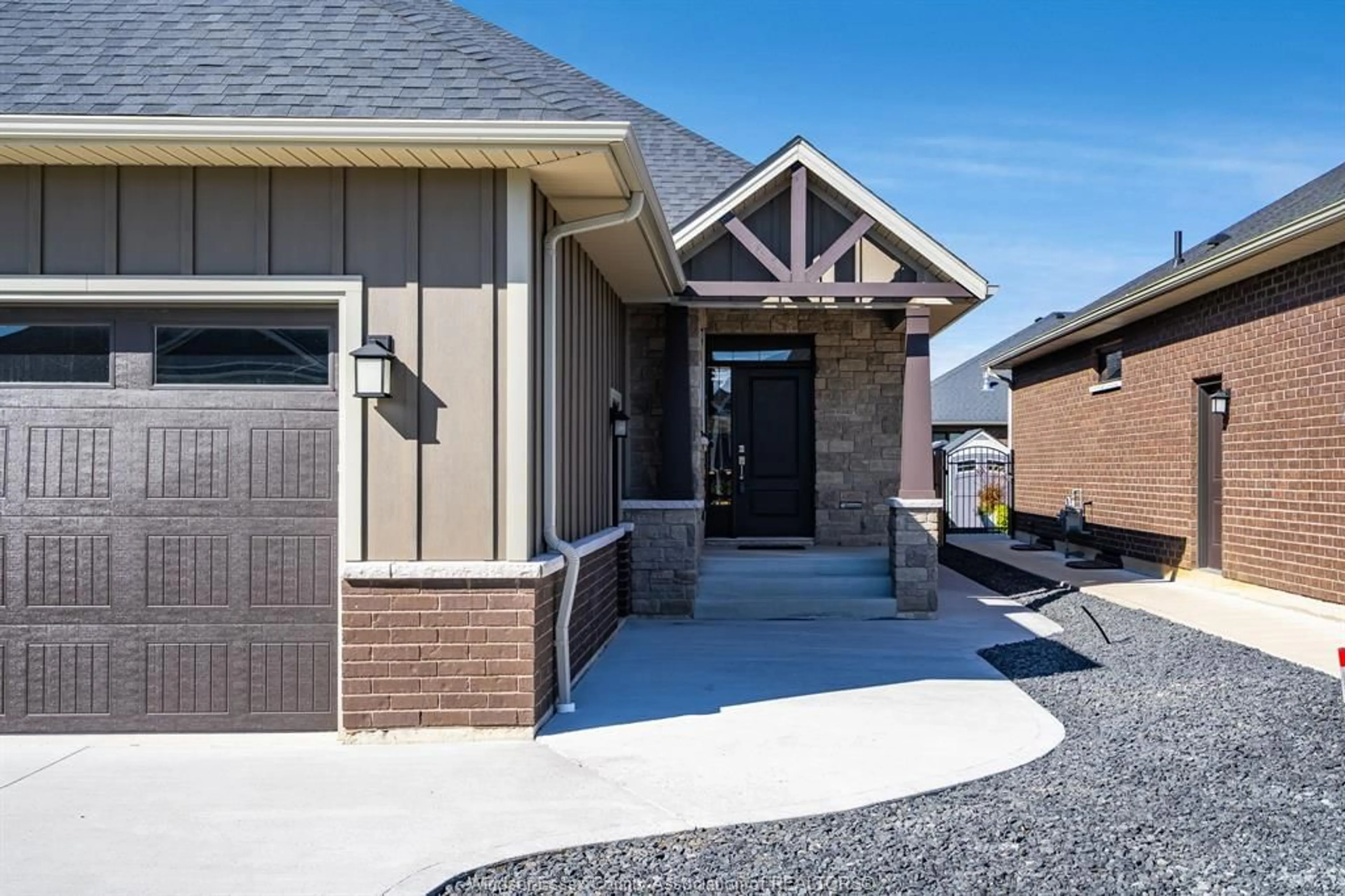 Home with brick exterior material, street for 12 Robin Crt, Kingsville Ontario N9Y 0E1