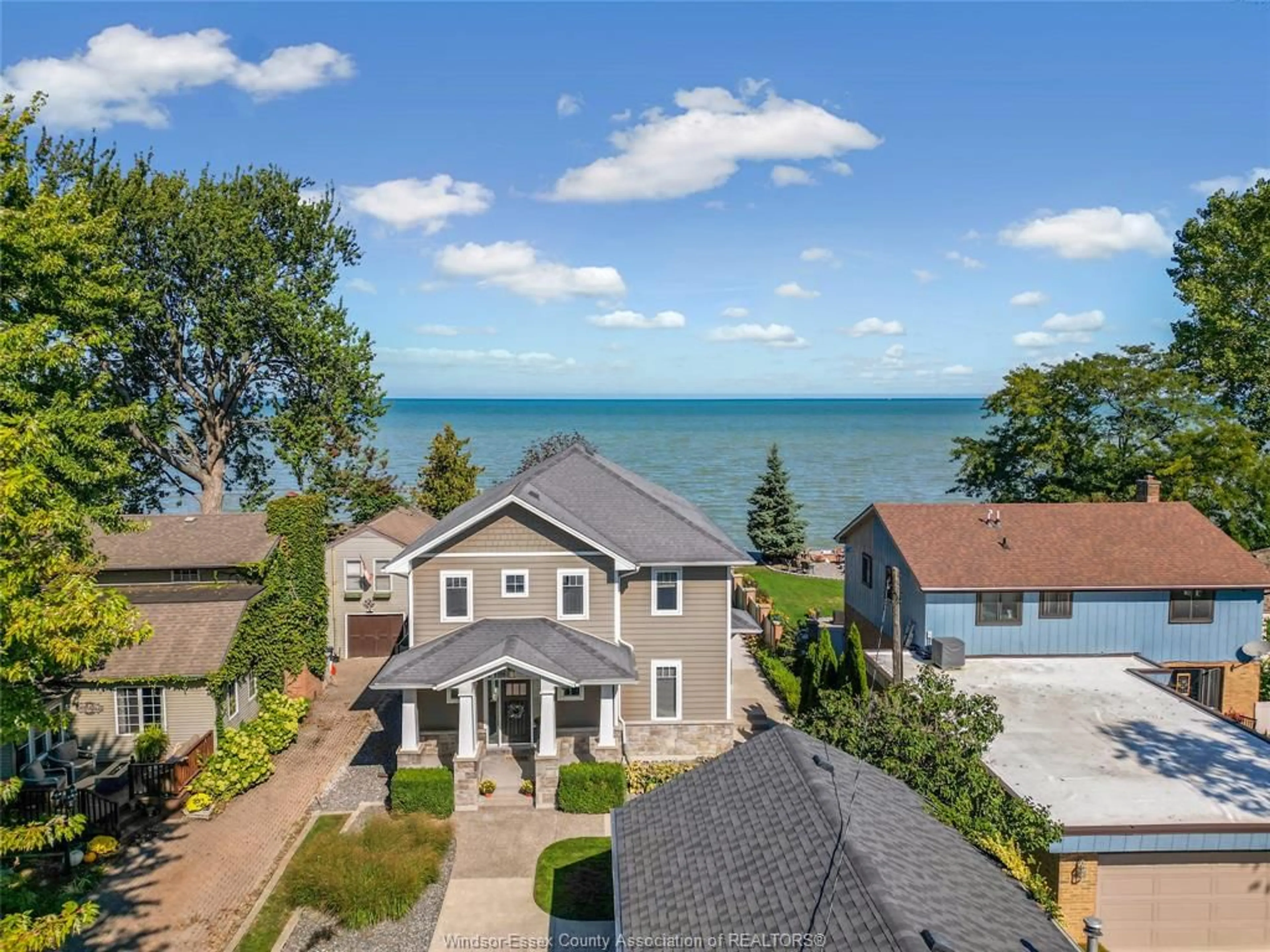 A pic from outside/outdoor area/front of a property/back of a property/a pic from drone, water/lake/river/ocean view for 435 LAKEVIEW, Belle River Ontario N8L 0M1